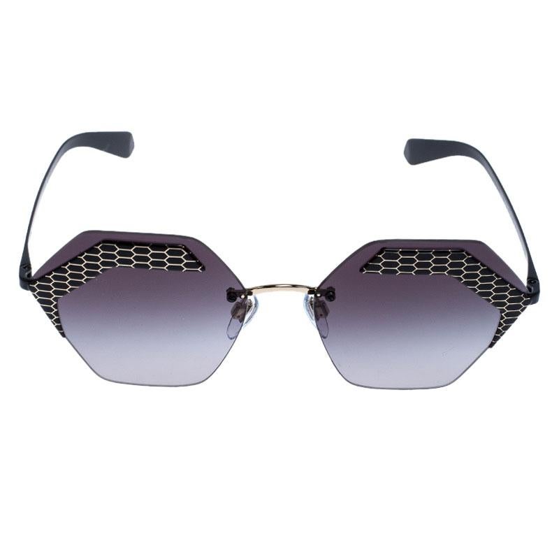The stylish frame sculpted in acetate and metal into a hexagonal shape and Serpenti accents on the front, make these sunglasses a high-fashion accessory that you must own. From the house of Bvlgari, they will look best with your daytime statement