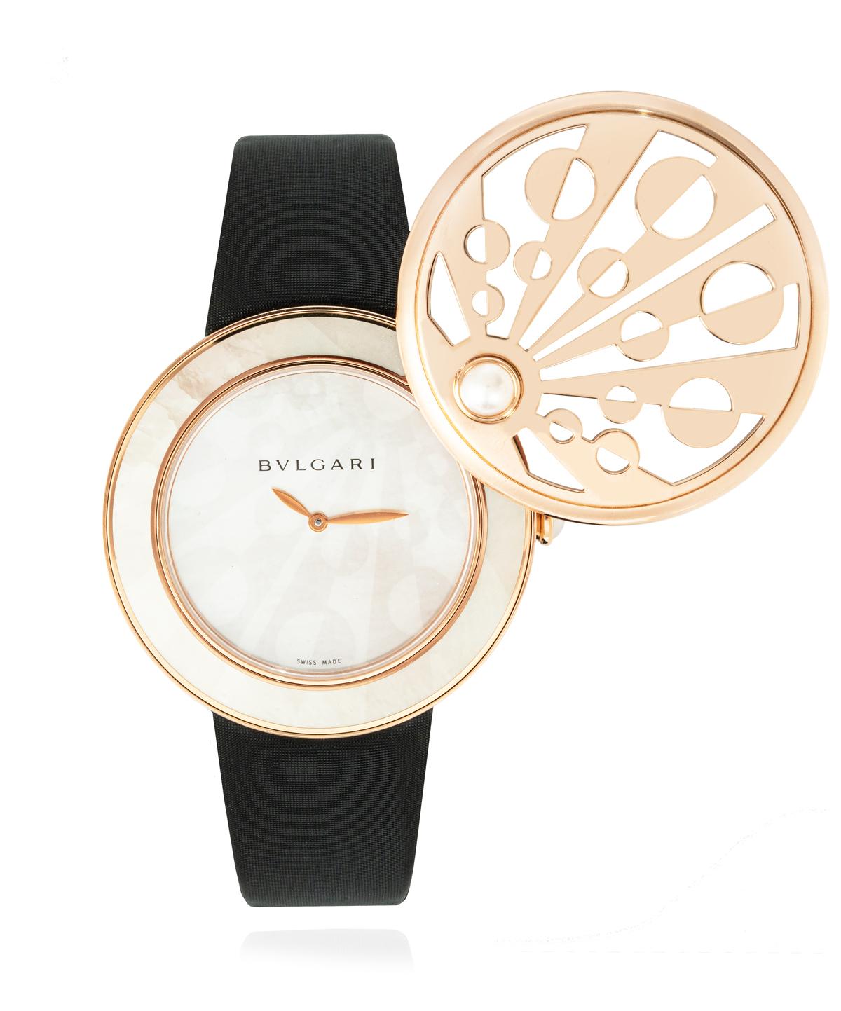 A rare Bvlgari Mediterranean Eden ladies wrist watch reference MEP40WGPL.
Inspired in the mediterranean history and culture this watch fetures a 40mm 18K rose gold case with an openworked pivoting cover that slids up revealling an elegant