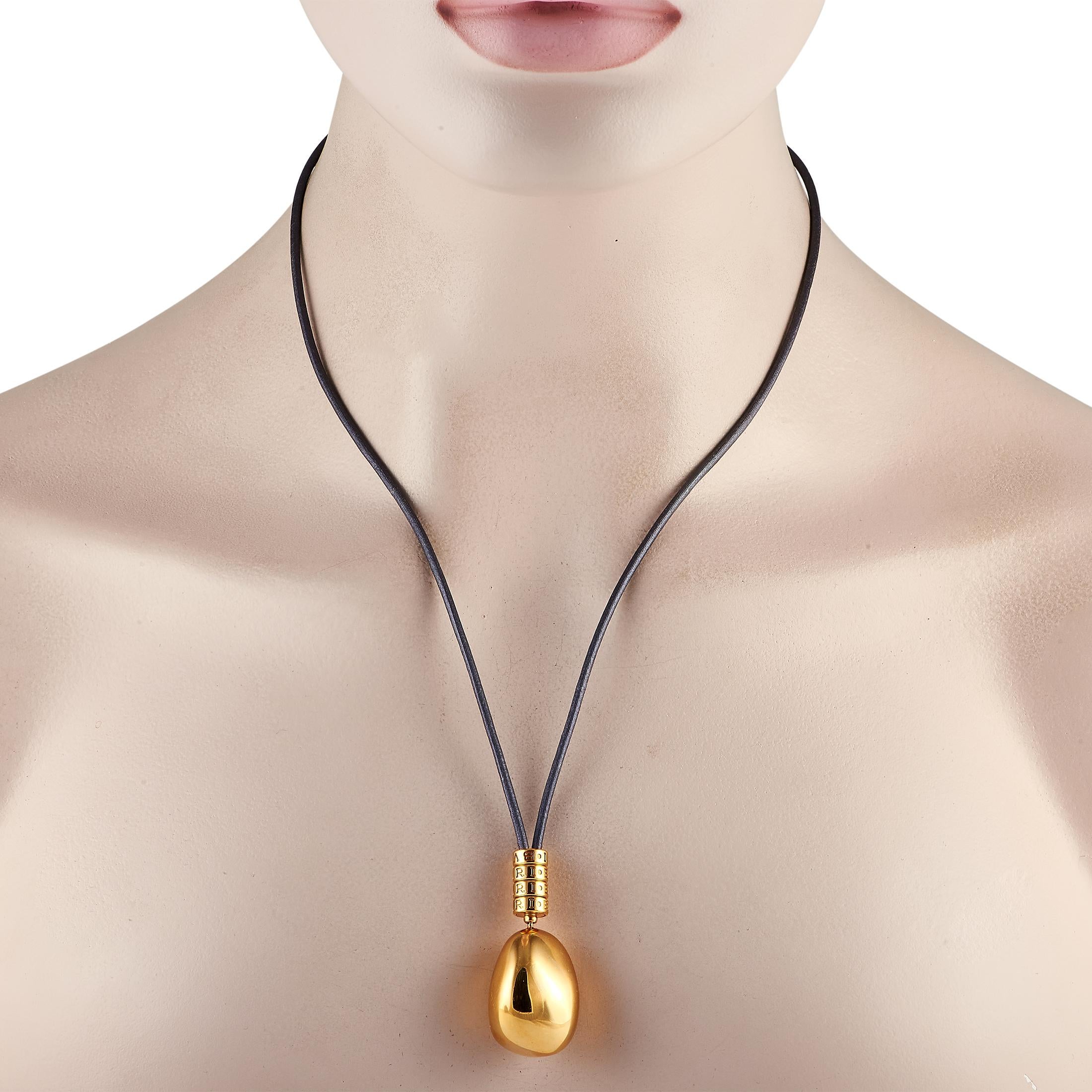 A glossy golden gem from the Mediterranean Eden collection of the House of Bvlgari. This necklace features a black cord lace measuring 24