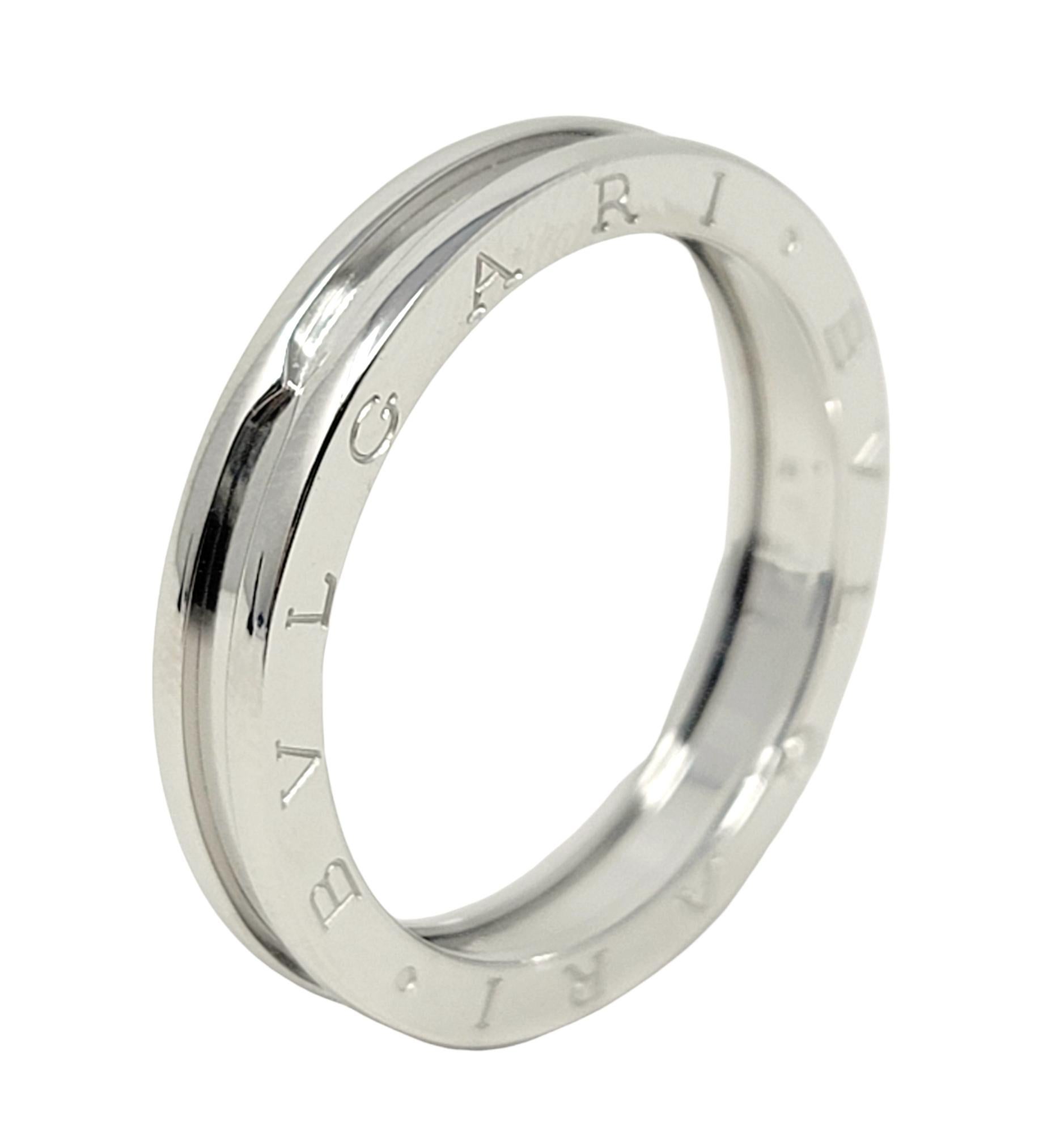 Ring size: 12

Sleek 18 karat white gold contemporary designer band ring by Italian luxury brand, Bvlgari. 

Metal: 18K White Gold
Ring size: 12
Euro size: 67
Outer diameter: 27 mm
Band Width: 4.65 mm
Weight: 8.7 grams
Stamped: BVLGARI 750 Made in