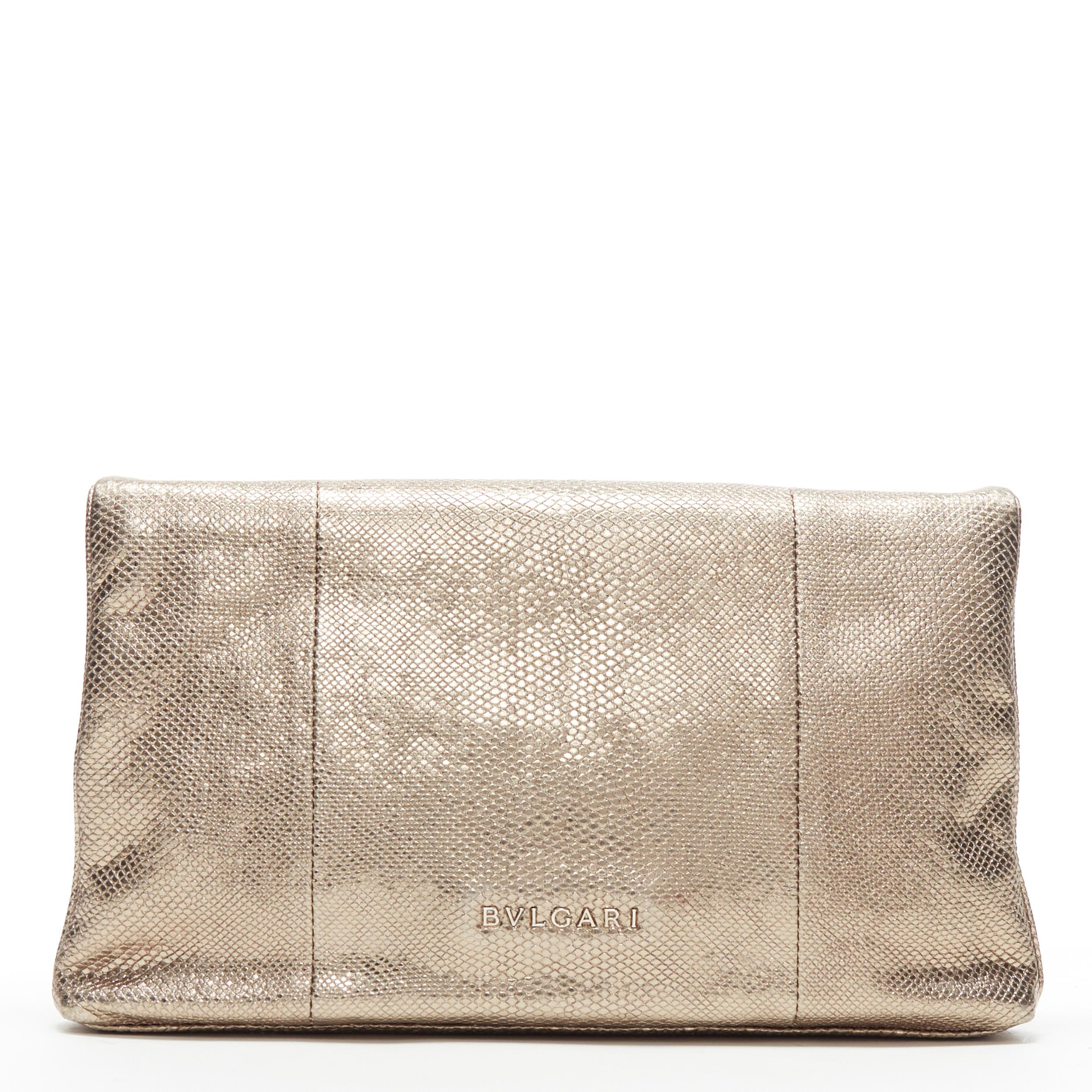 BVLGARI metallic gold leather silver buckle foldover shoulder chain clutch bag
Brand: Bvlgari
Model Name / Style: Foldover clutch
Material: Leather
Color: Gold
Pattern: Solid
Closure: Magnetic
Extra Detail:
Made in: Italy

CONDITION: 
Condition: