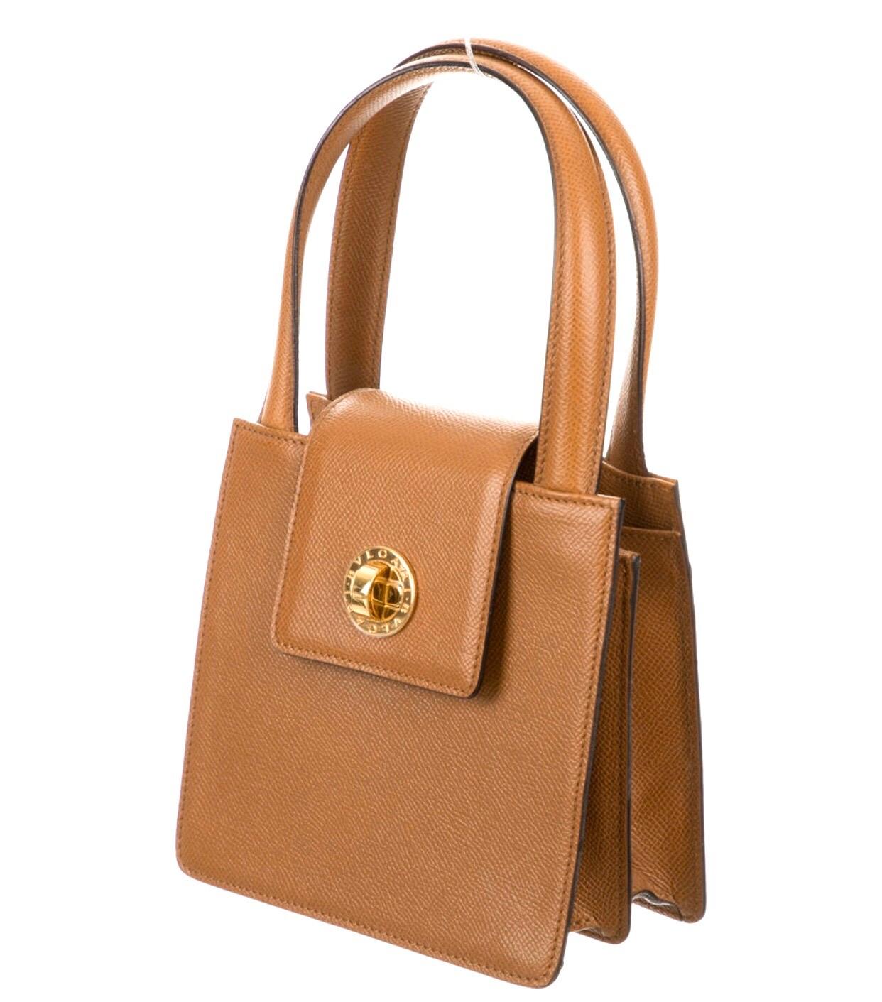 Bvlgari Brian leather mini handbag. Double handles, turn lock closure. Condition: excellent 
