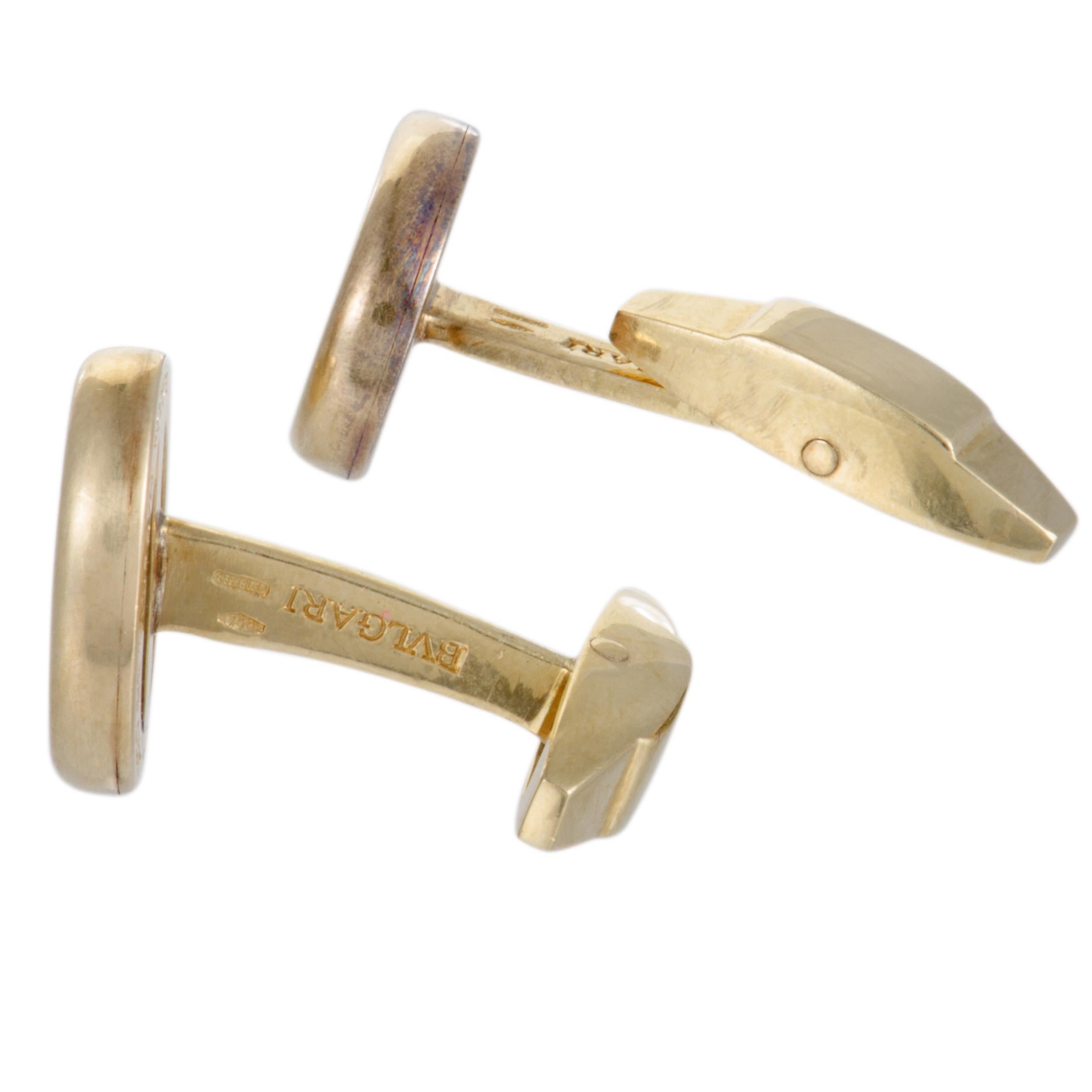 These stunning vintage cufflinks are a Bvlgari design and offer a captivatingly masculine appearance. The cufflinks are made of luxurious 18K yellow gold and each weighs 6.3 grams.
