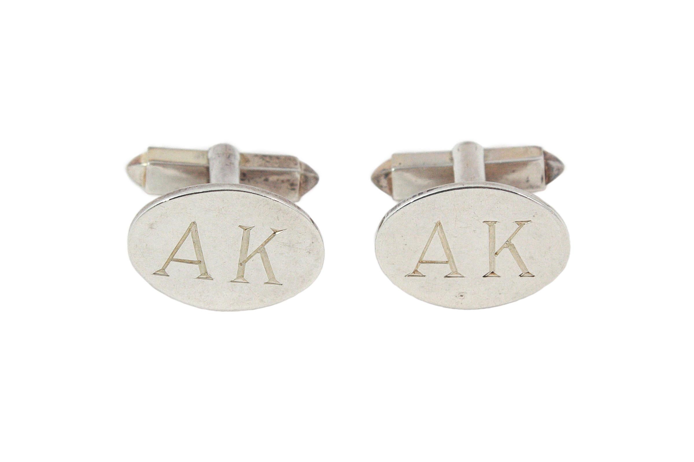 Oval cufflinks
AK monogram 
Made by Bvlgari
Sterling Silver 

BVLGARI box included

It may be interesting to note that they had been custom ordered from BVLGARI by Arnold Kopelson the Academy Award winning producer of PLATOON, as well as numerous