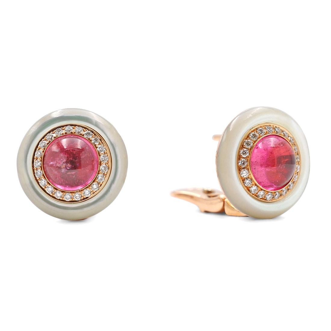 Authentic Bvlgari stud earrings crafted in 18 karat rose gold. The concentric circular design features an outer rim of mother of pearl, an inner rim of round brilliant cut diamonds, and centers of a cabochon pink tourmaline. The earrings measure