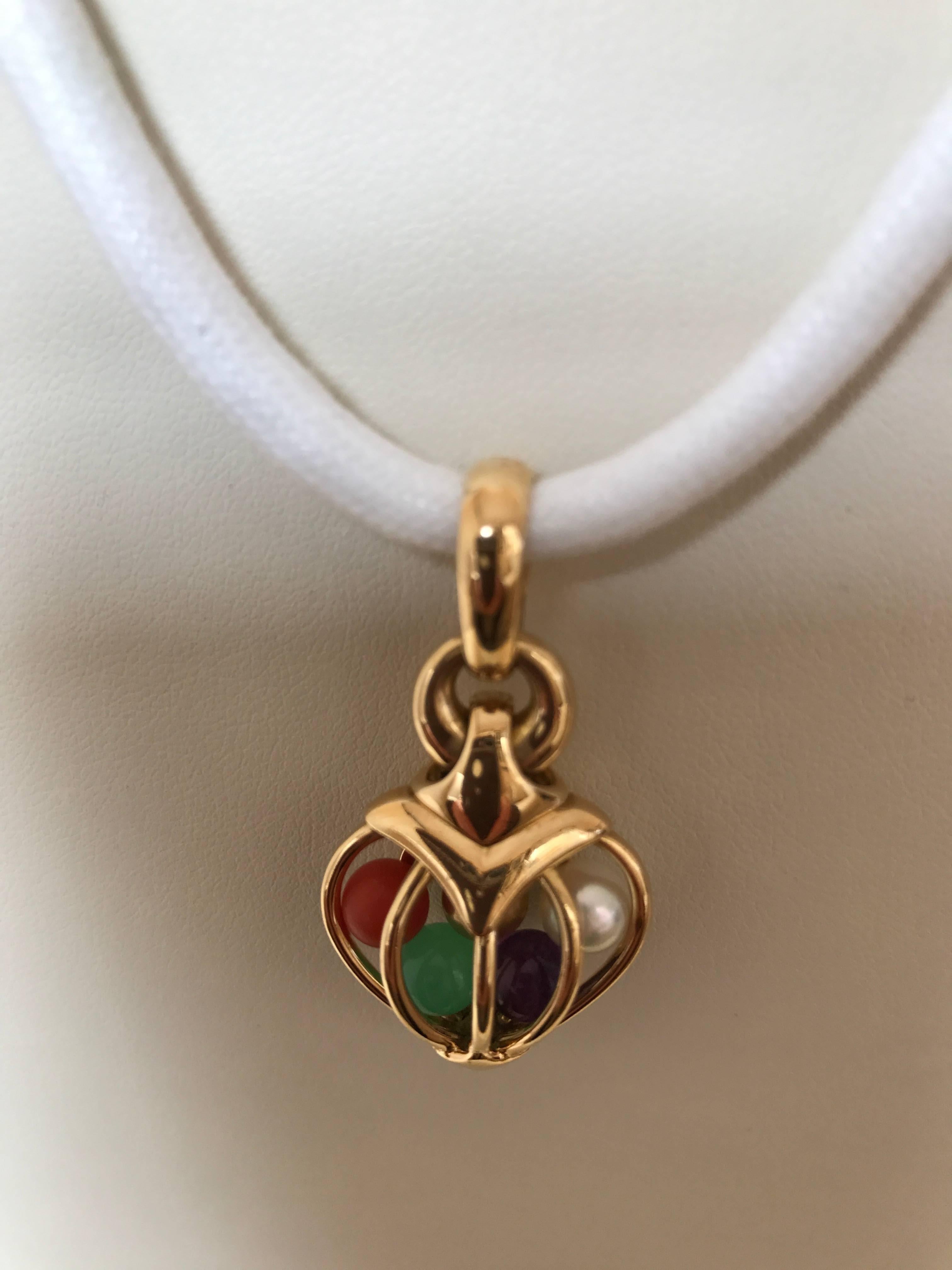 Circa 1970 Bvlgari Multi Gemstone 18K Yellow Gold Heart Pendant In Excellent Condition For Sale In London, GB