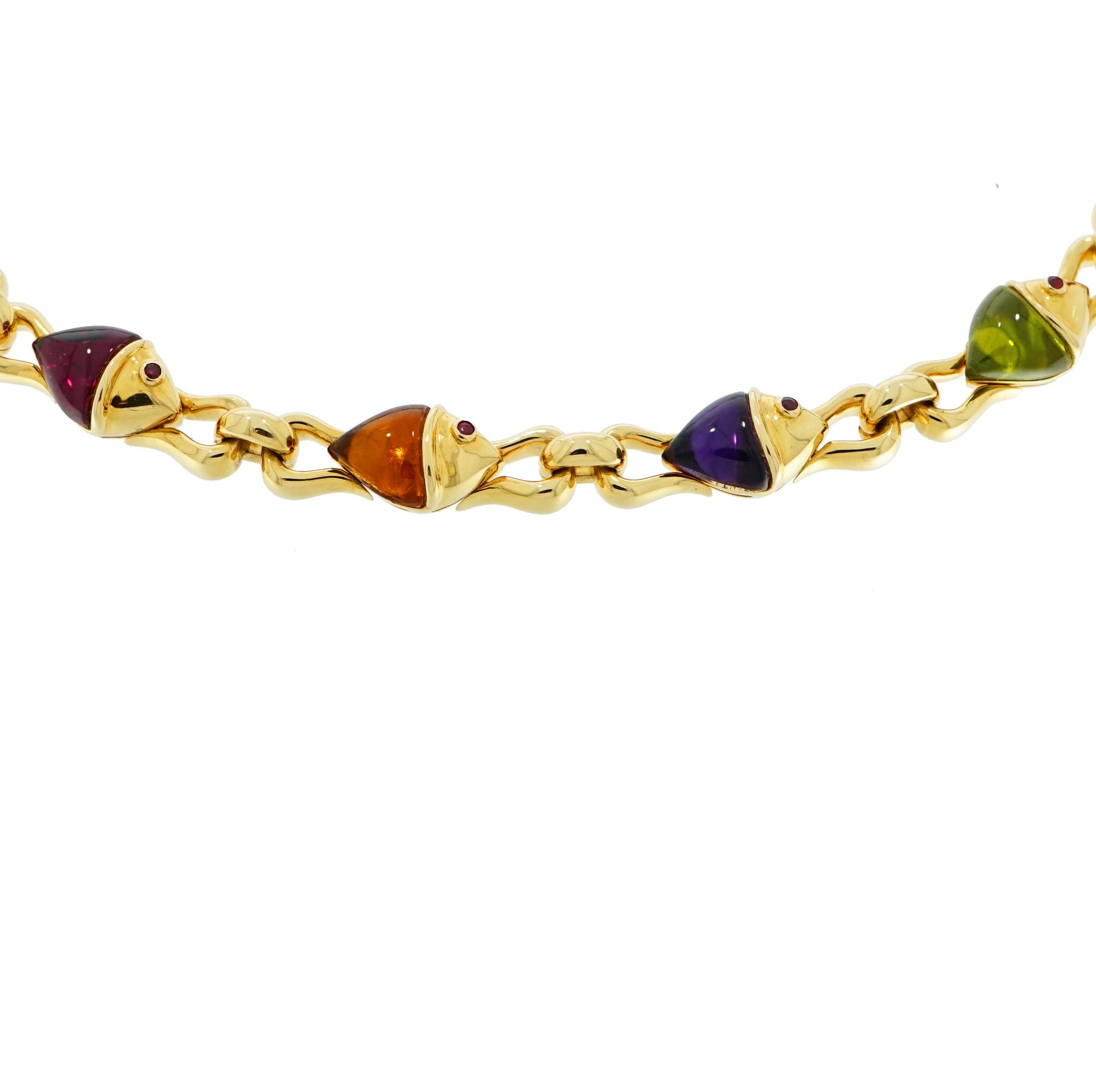 This previously loved necklace is from Bvlgari's signature Naturalia collection. A gorgeous necklace that features colorful fish design. 
Crafted in a high polished 18 karat yellow gold forming beautiful rounded links connecting seamlessly each fish