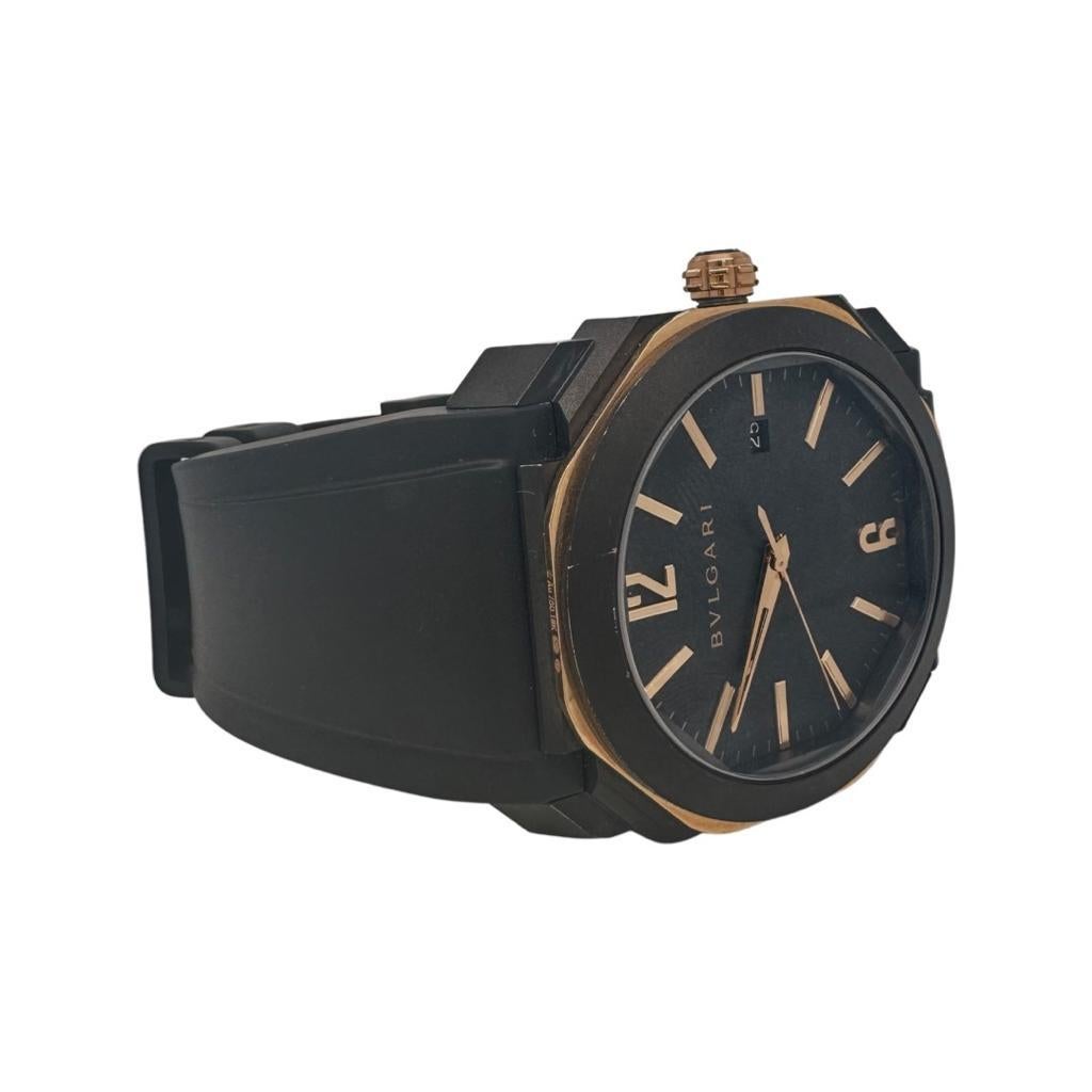 Designer: Bvlgari

Style: Wrist Watch 

Model Name: Octo Nero

Model Number: BGO41S / 102581

Case Size: 41mm

Dial Color: Black​​​​​​​

Bezel: Rubberclad Stainless Steel & 18K Rose Gold 

Strap: Original Factory Rubber 

Functions: Hour Minute &
