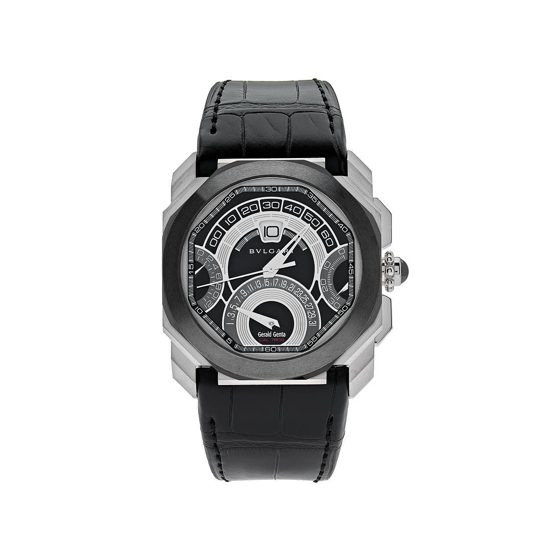 The Bvlgari OCTO Retrogradi men's watch features a 45mm silver-tone stainless steel case with transparent case back, crown set with onyx cabochon. It features a black lacquered dial with steel hands and Arabic numeral hour markers. The date display