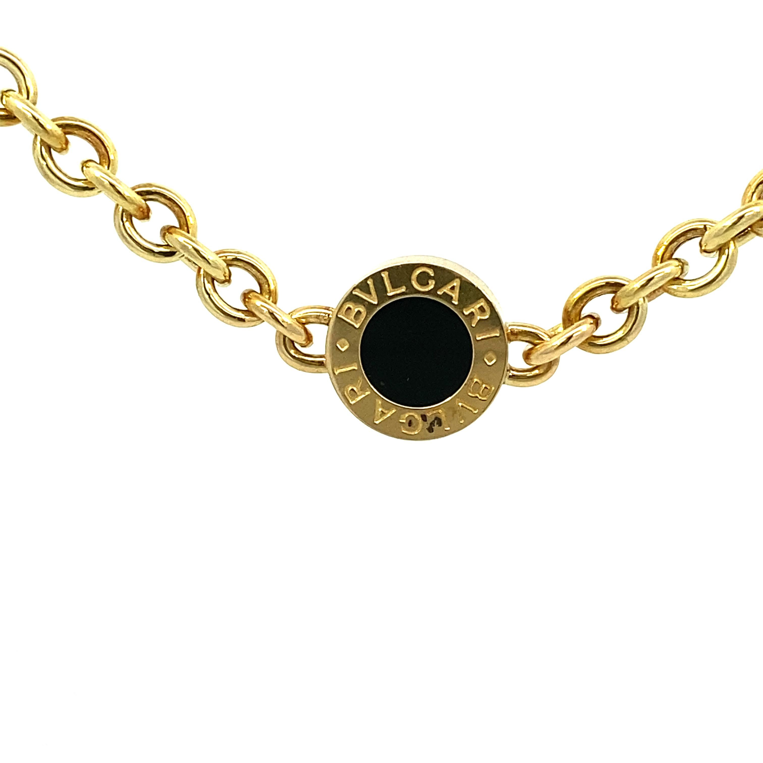 Introducing the exquisite Bvlgari Onyx Gold Link Necklace, an opulent piece that effortlessly combines bold design and luxurious materials. Crafted with utmost precision, this necklace is a true testament to Bvlgari's renowned craftsmanship and