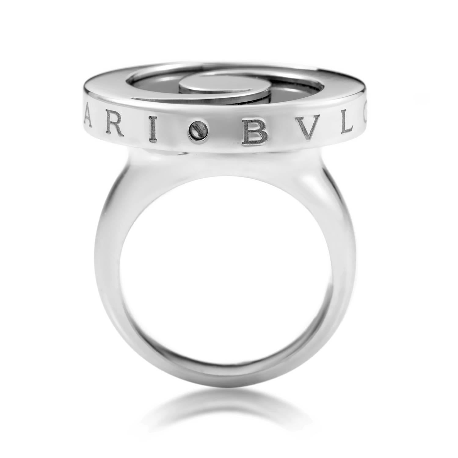 Employing the captivating darkness of onyx in a manner that will catch your eye and lure your gaze along the graceful lines, this magnificent ring from Bvlgari is made of 18K white gold and boasts a marvelous appealing shape.<br />Ring Ring Top