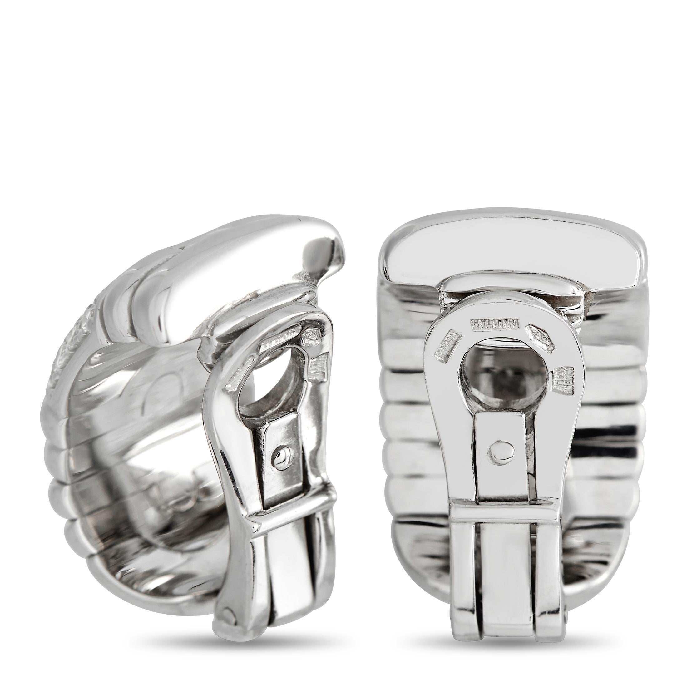 A bold 18K white gold setting makes these Bvlgari Parentesi earrings simply unforgettable. Curved lines are juxtaposed with inset diamonds totaling 0.50 carats on these sleek, understated earrings. Each one measures 0.75” long by 0.50” wide.  

This