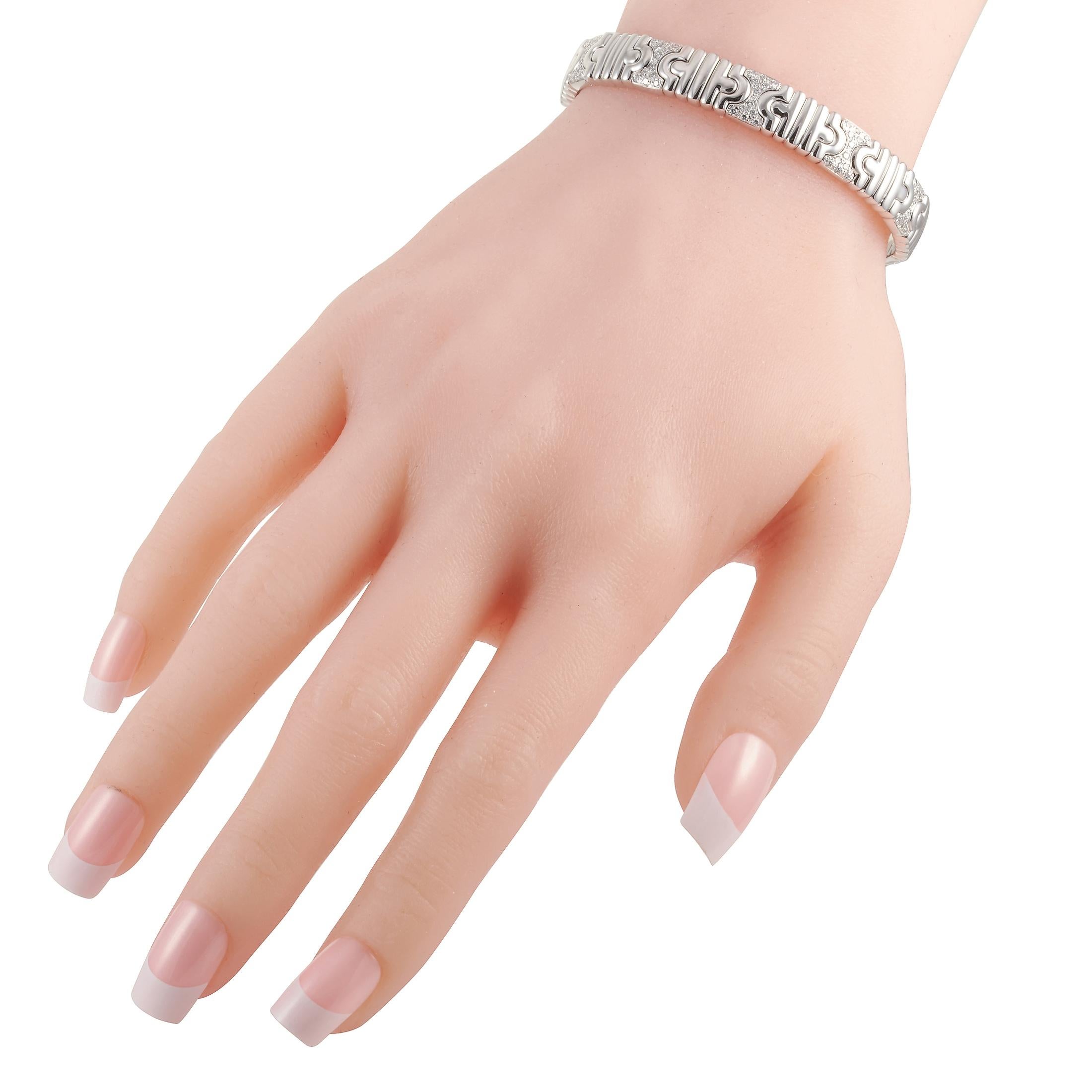 The Bvlgari “Parentesi” bracelet is made of 18K white gold and embellished with diamonds that boast E color and VVS clarity and amount to 1.00 carat. The bracelet weighs 42.7 grams and measures 7.065” in length.
 
 This jewelry piece is offered in