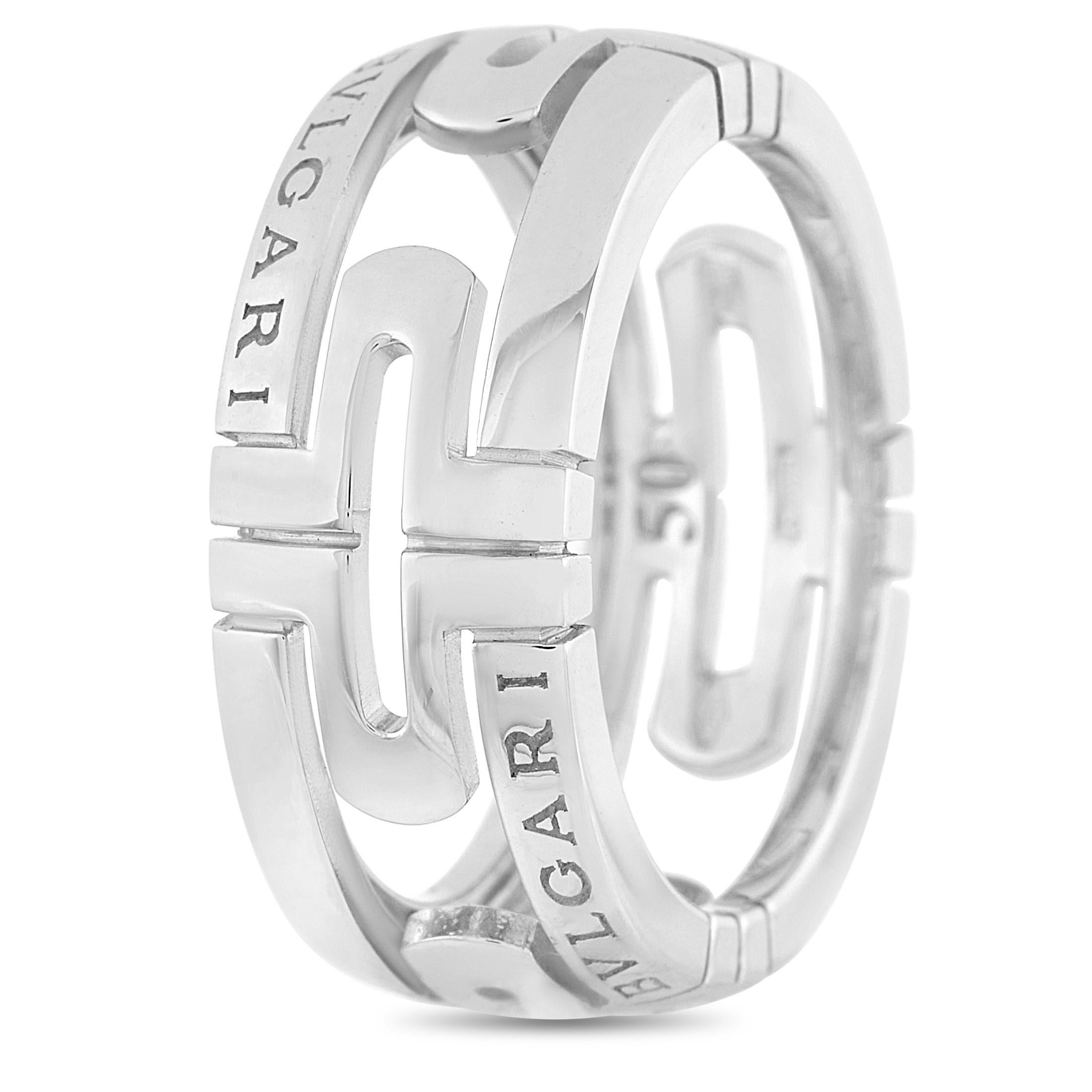 This unique Bvlgari Parentesi 18K White Gold Ring is made with 18K white gold and bears the Bvlgari brand name throughout the openwork band. The ring has a band thickness of 8 mm, and a total weight of 6.7 grams.

The ring is presented in estate