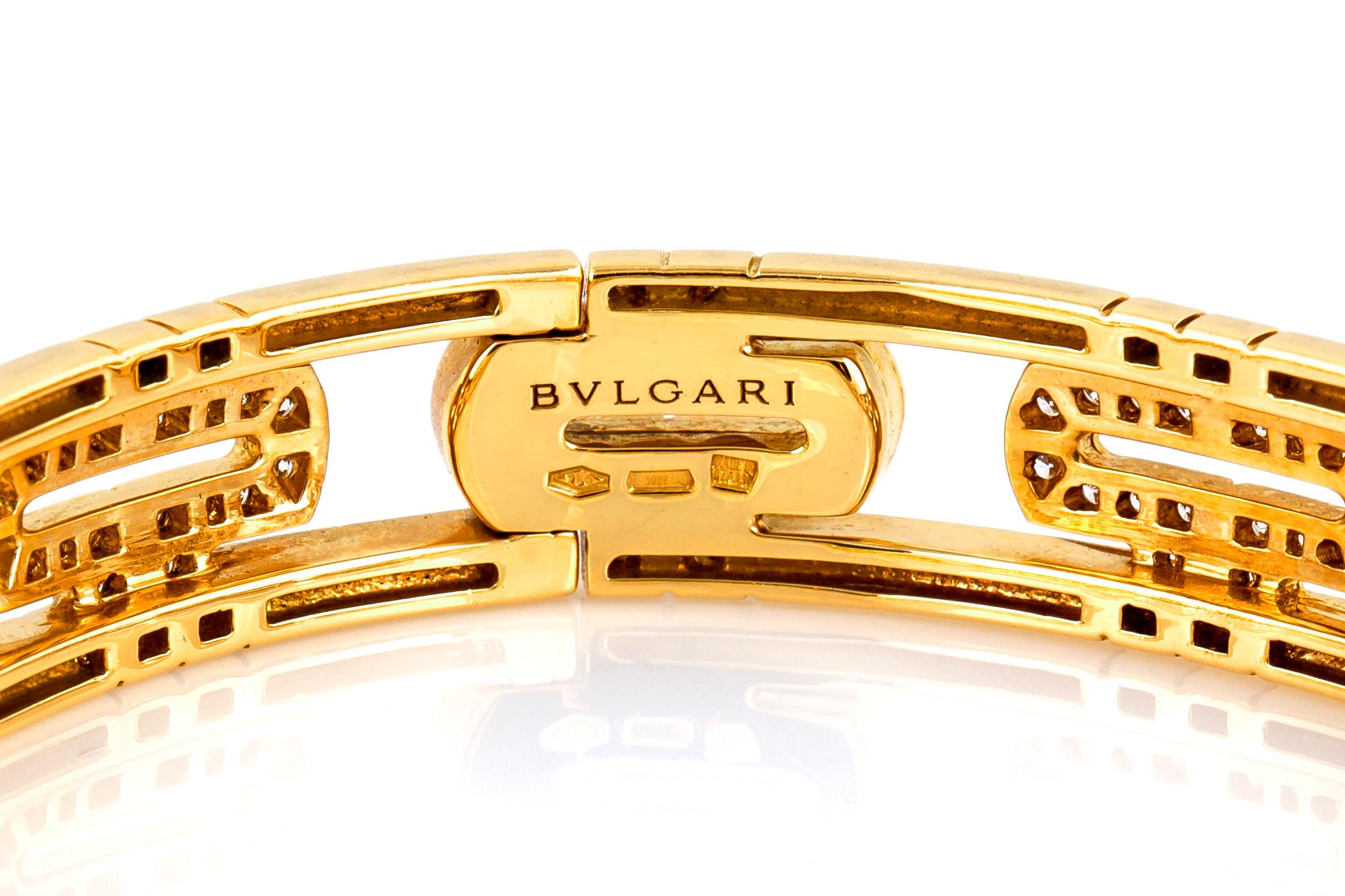 Bvlgari Parentesi bangle bracelet, finely crafted in 18 k yellow gold incrusted with brilliant cut diamonds.