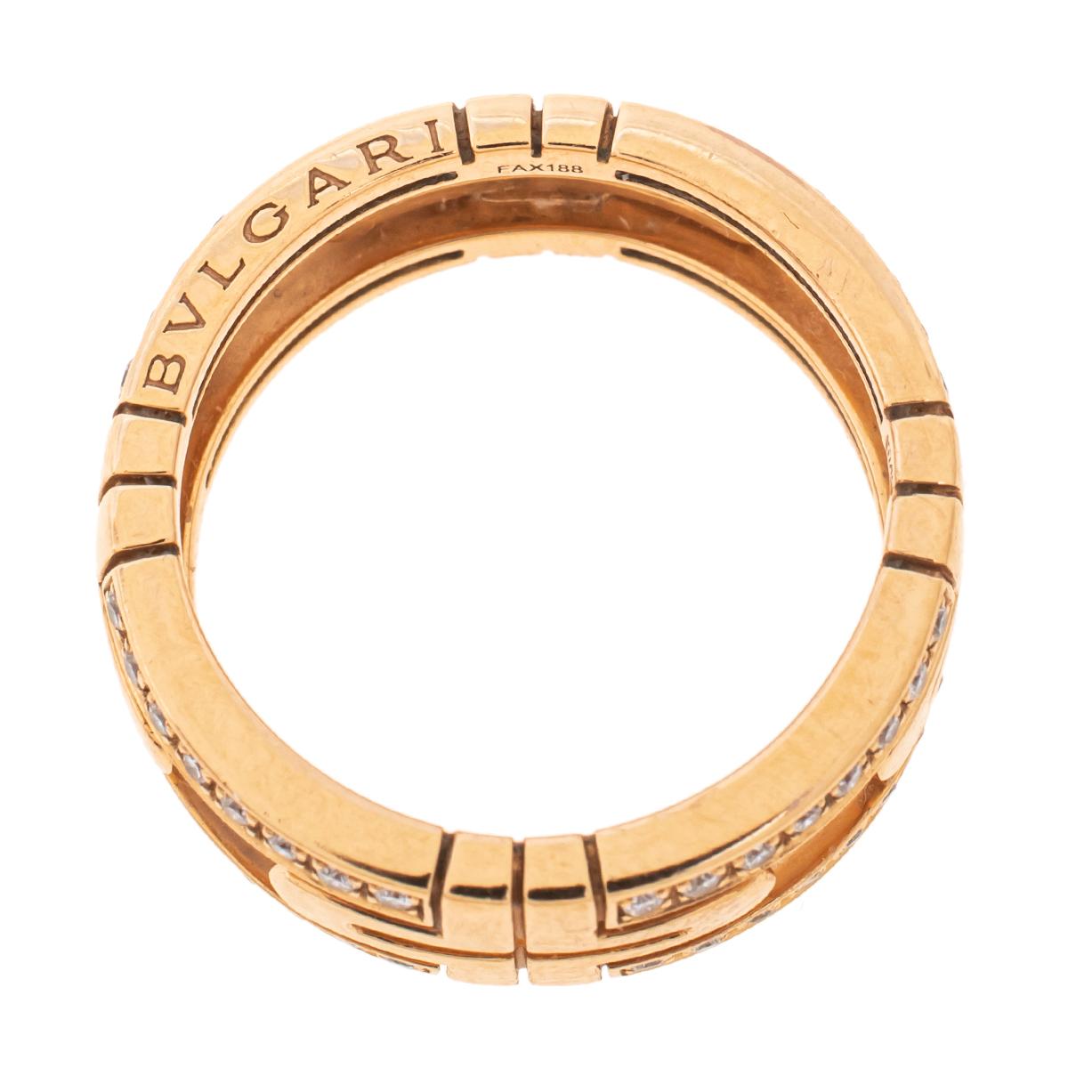 This Parentesi ring from Bvlgari is characterized by strong geometric shapes partially set with sparkling diamonds. The ring is sculpted from 18k rose gold to a smooth finish and is bound to offer an element of luxury to your ensemble of the day or