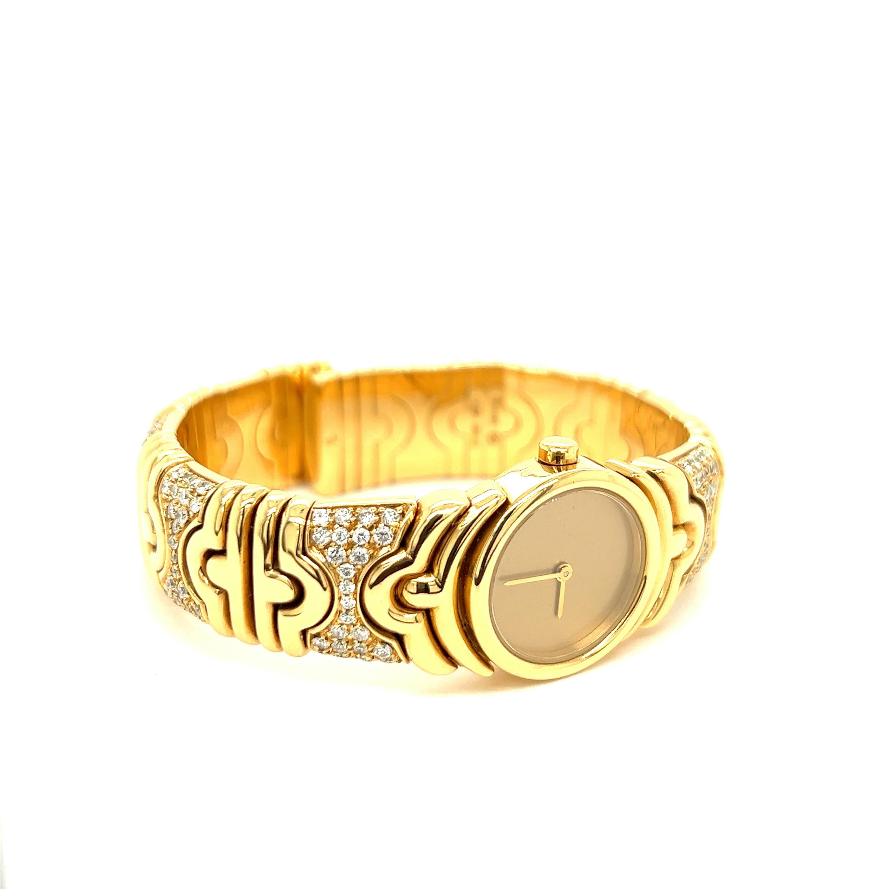 Bvlgari Parentesi Diamond 18k Yellow Gold Cuff Wristwatch

From the luxury brand's iconic Parentesi collection, this cuff wristwatch features stunning round-cut diamonds set on beautiful 18 karat yellow gold; it has a circular shaped dial and quartz