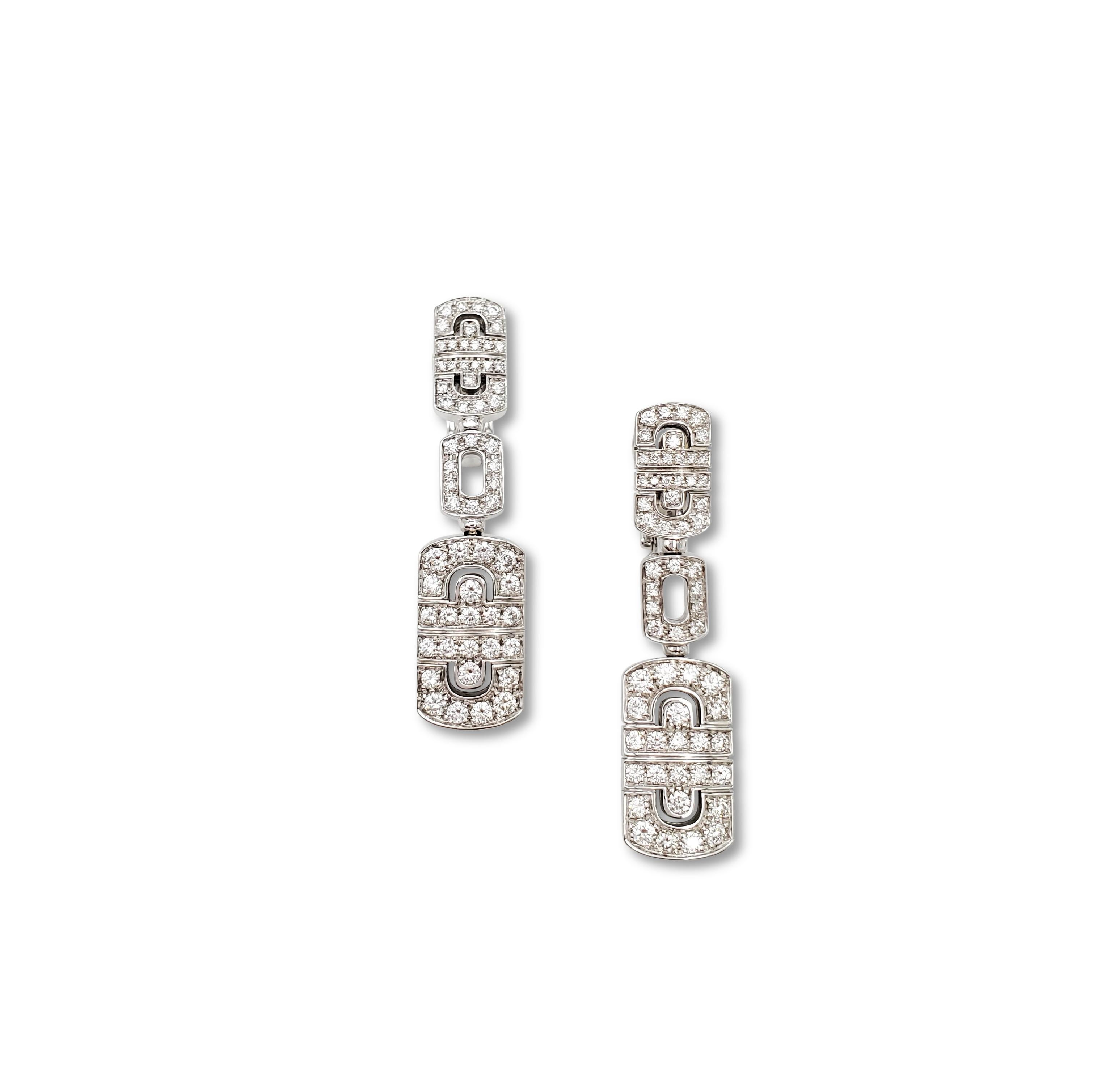 Authentic Bvlgari Parentesi earrings crafted in 18 karat white gold and set with approx. 2.60 carats of round brilliant cut diamonds (F color, VS clarity) total weight. Signed Bulgari, 750, Made in Italy, with serial number. The earrings measure 43