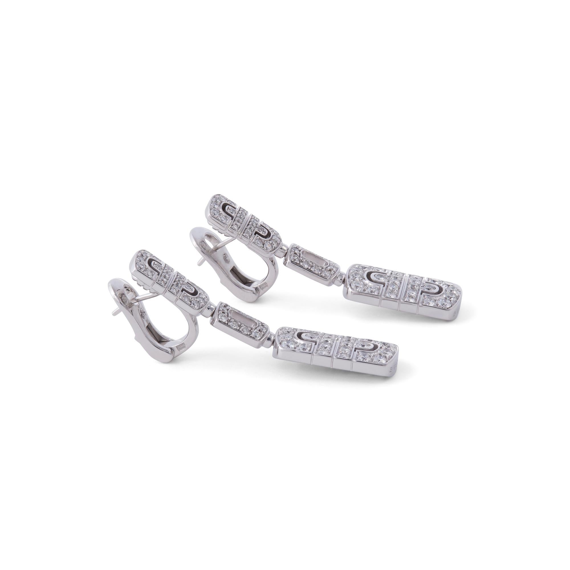 Authentic Bvlgari Parentesi earrings crafted in 18 karat white gold and set with approx. 2.70 carats of round brilliant cut diamonds (F color, VS clarity) total weight. Signed Bvlgari, 750, Made in Italy. The earrings measure 43 mm in length, 11 mm
