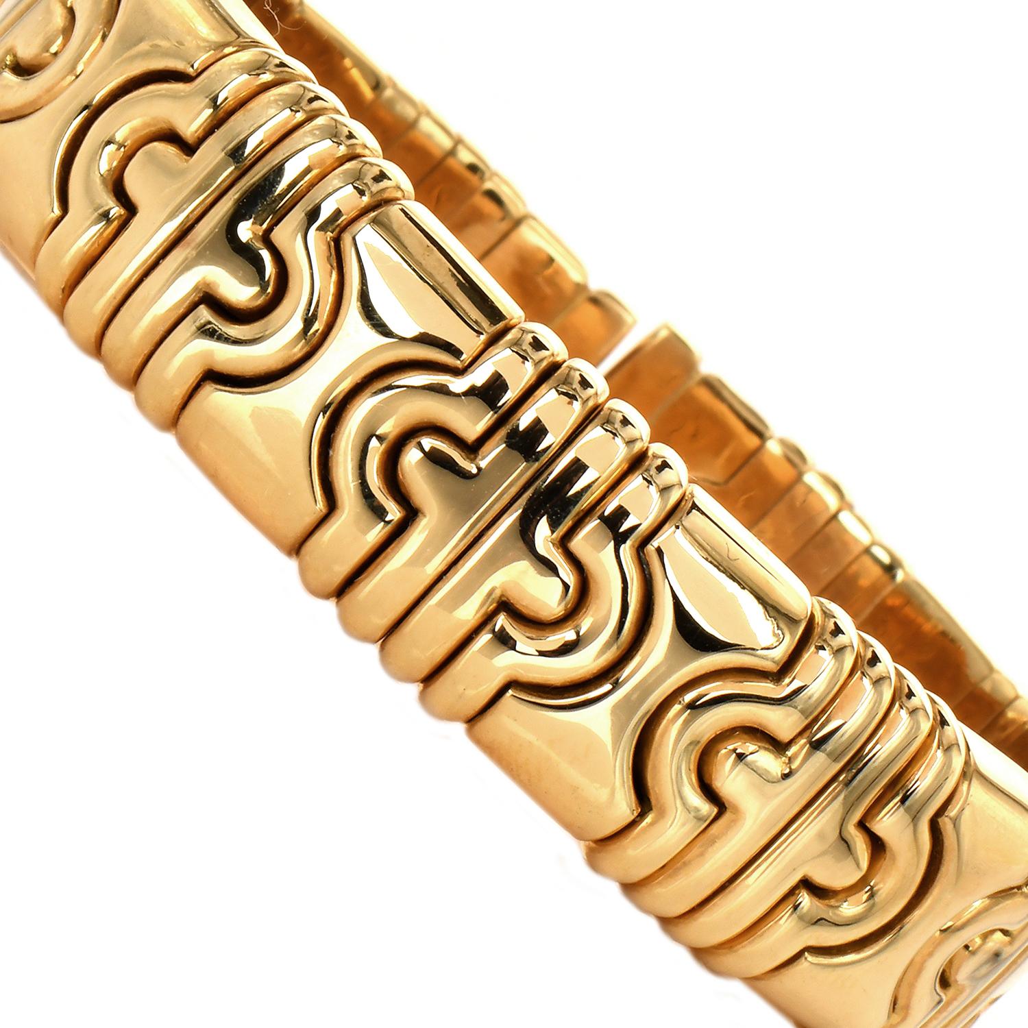 This feminine Vintage 1980's Bvlgari cuff bracelet from Parenthesis Collection is crafted in solid 18K gold. 

Weight is approx: 84.2 Grams 

Width/Height is approx: 5.5 - 6.5 inches wrist 

(Adjustable opening) - 14mmWide

Condition: