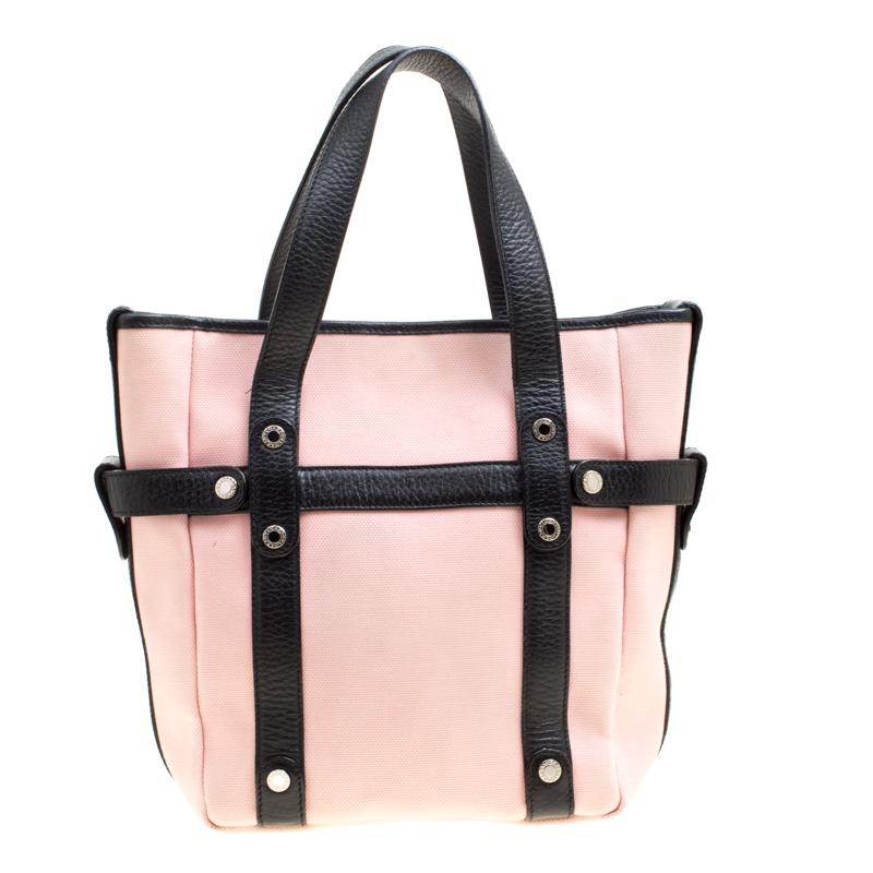 Go for this Bvlgari bag if you like to keep it subtle yet polished. Lined with nylon, this fashionable and durable bag has enough space to carry all your everyday basics. Revamp your dresser essentials by adding this fantastic handbag crafted from