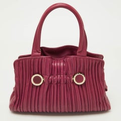 Bvlgari Cartera Twistino Tina de piel rosa