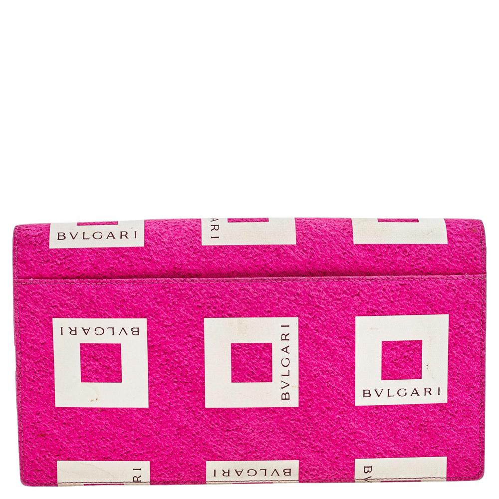 Carry this wallet from the house of Bvlgari for your daily outings. It has been expertly crafted from logo-printed fabric in a flap style. It opens to a leather-lined interior fitted with a zip pocket.

Includes: Strap not Included
