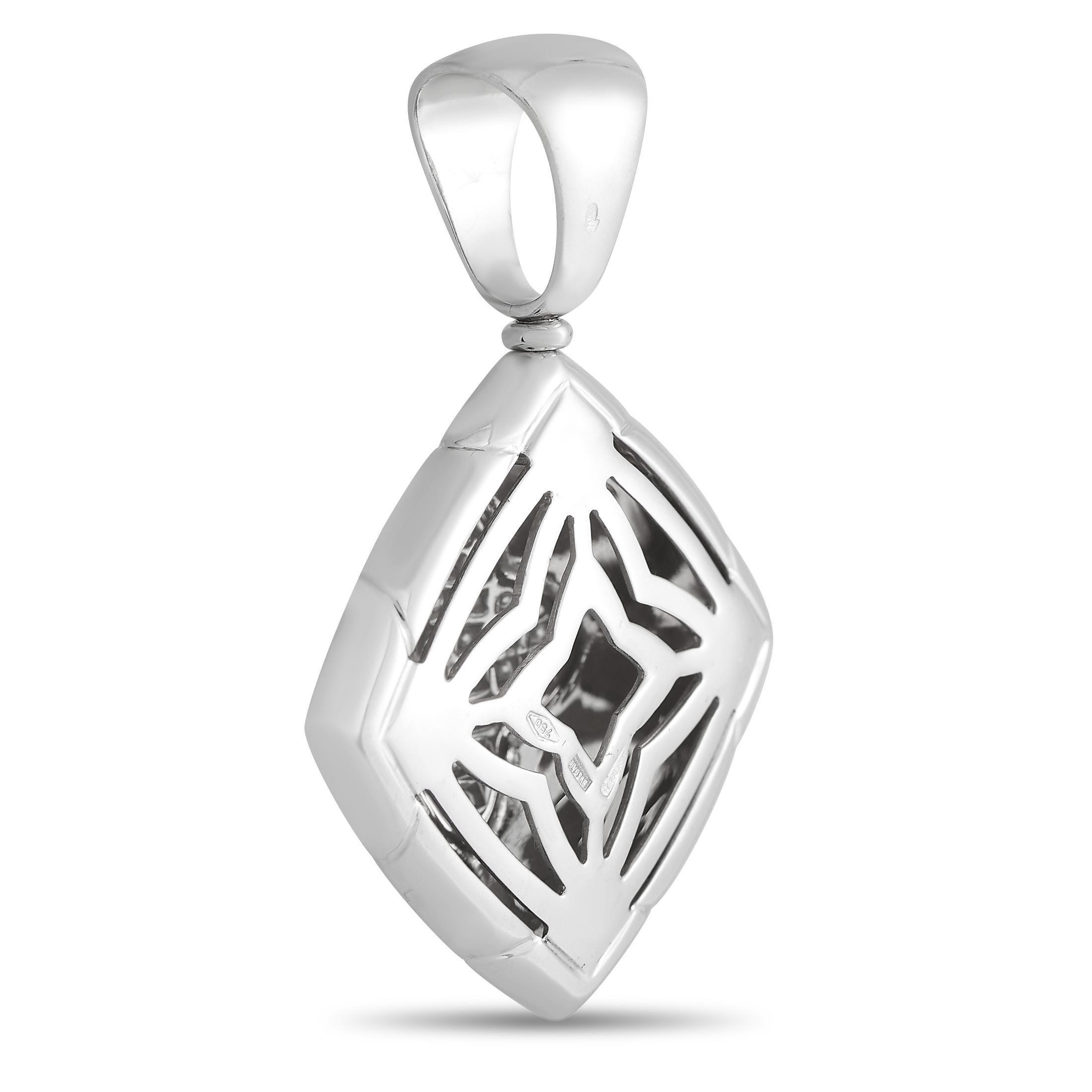 Clean lines and a classic sense of style are the hallmarks of this Bvlgari Pyramid Pendant. Sparkling diamonds in a geometric arrangement add sparkle to the simple 18k White Gold setting, which measures 1.75” long by 1.25” wide. 