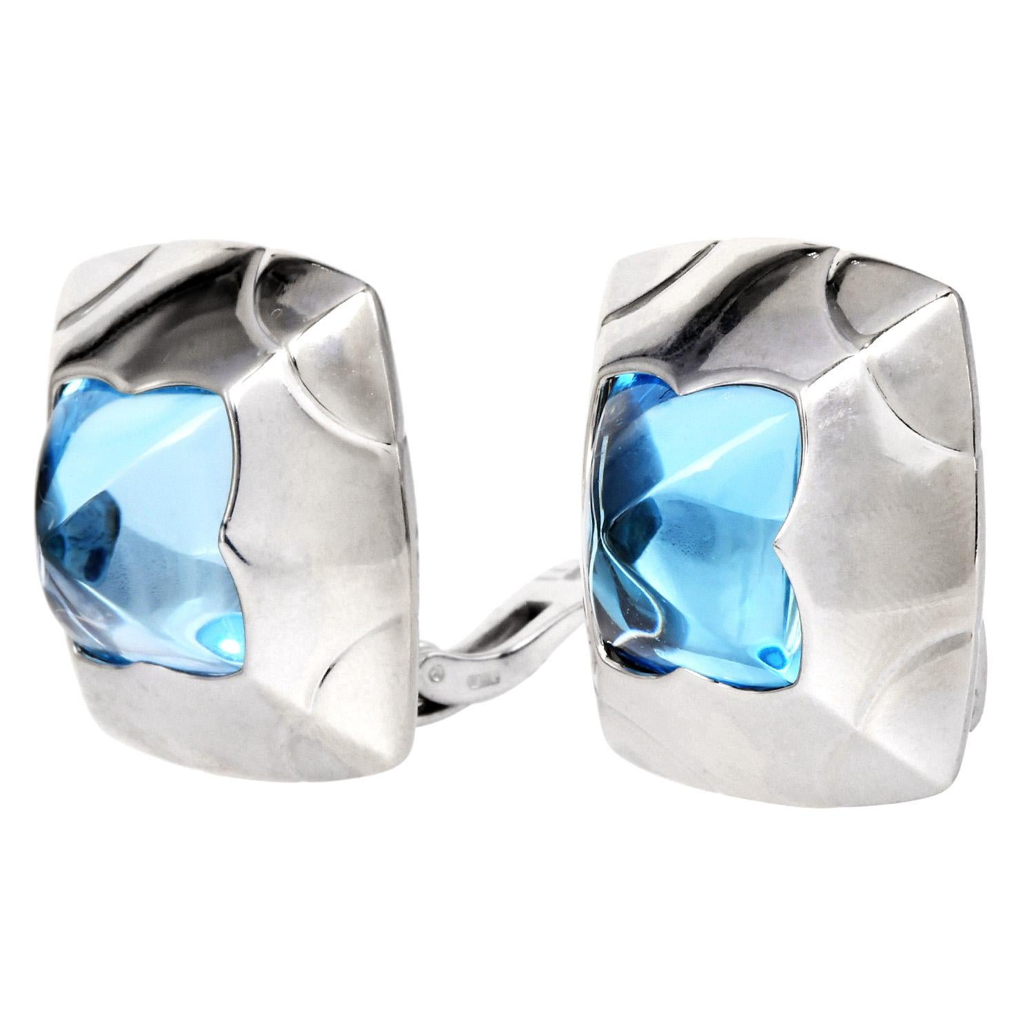 A bold and contemporary design by Bvlgari, these signature Pyramid earrings are crafted in 18K white gold and feature blue topaz stones set at the center. The sculptural square design showcases Bvlgari’s architectural aesthetic with a polished,