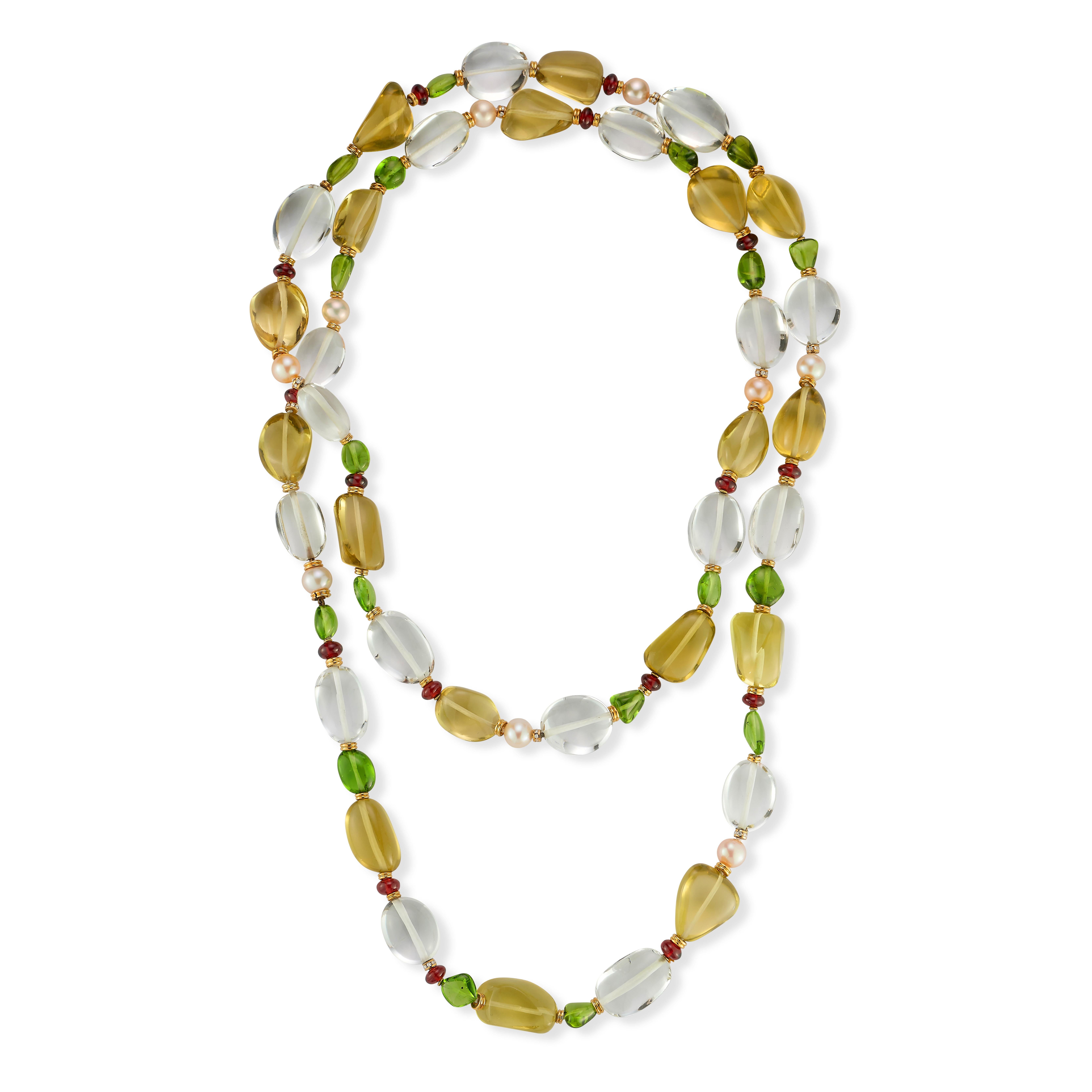 Collana di cristalli di rocca, tormalina e peridoto Bvlgari

Una collana 