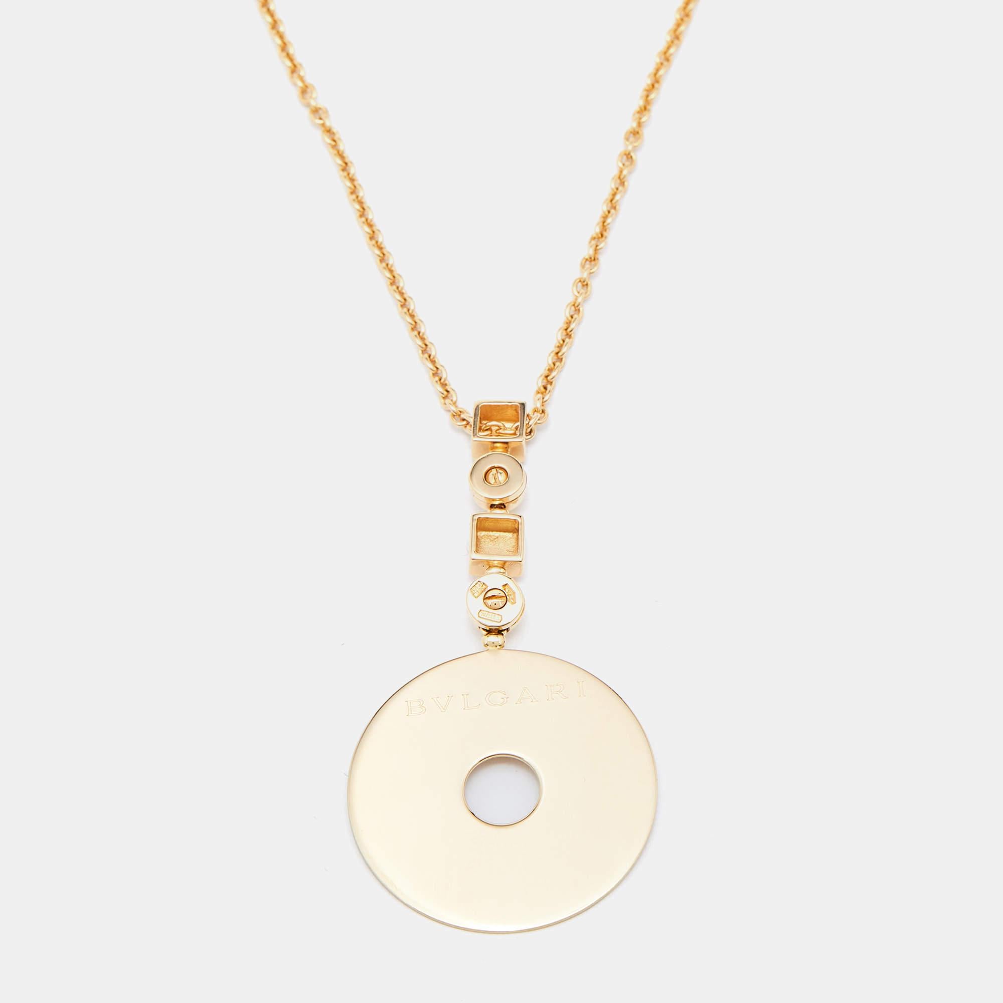 This necklace set comes with a matching pair of earrings. The pieces, designed by Bvlgari, are made of 18k yellow gold, and the design is simple, elegant, and timeless.

Includes: Original Case

