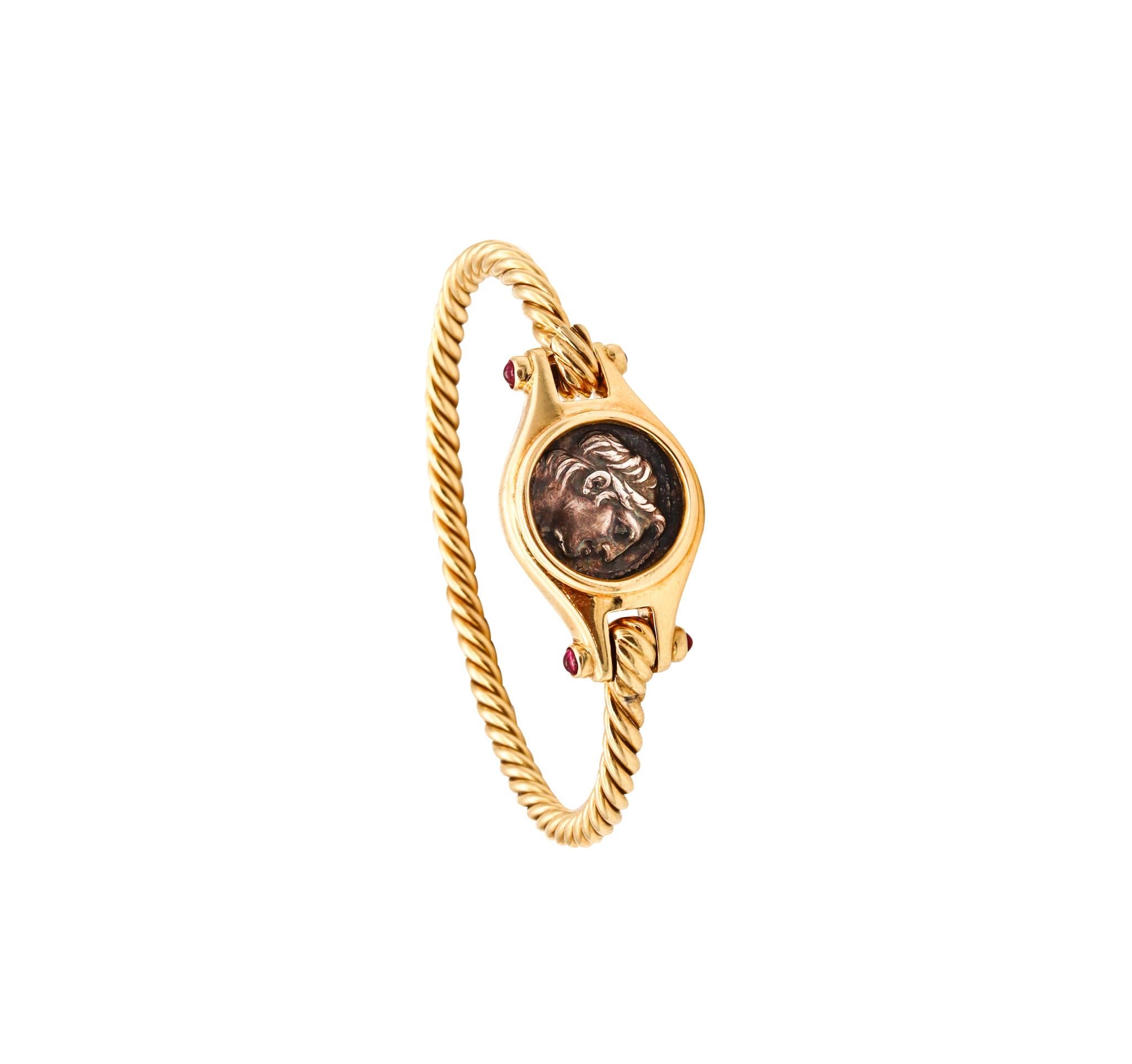 A Monete bracelet designed by Bvlgari.

An conic and popular piece created in Rome, Italy by the house of Bvlgari, back in the 1970's. This rare Monete bracelet has been crafted, with classic Greek-revival patterns in solid yellow gold of 18 karats,