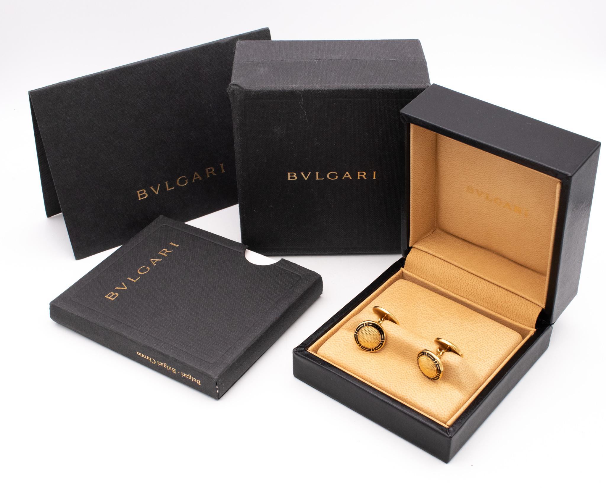 Beautiful Art-Deco cufflinks designed by Bvlgari.

Great elegant pair crafted in Rome, Italy in solid 18 karats of textured yellow gold. They are embellished with a Greek-Etruscan geometric pattern accents and decorated, with applications of black