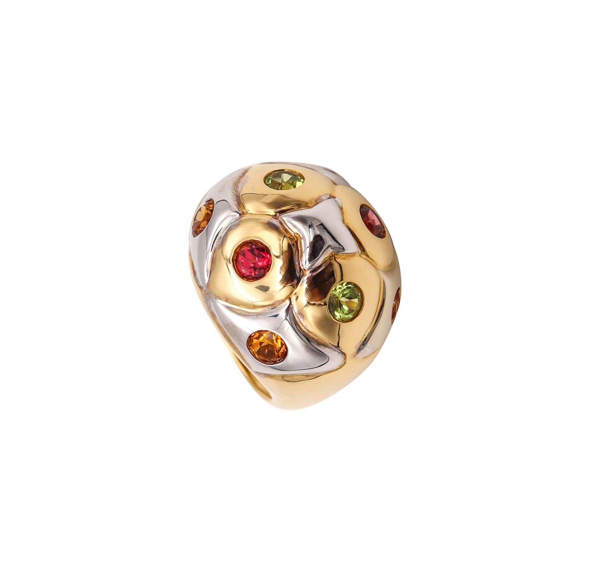 Cocktail Ring designed by Bvlgari.

A vintage piece, made in Italy by the house of Bvlgari. This bombe ring has been crafted in white and yellow gold of 18 karats, with high polished finish.

It is mounted, with 8 round brilliant cut natural