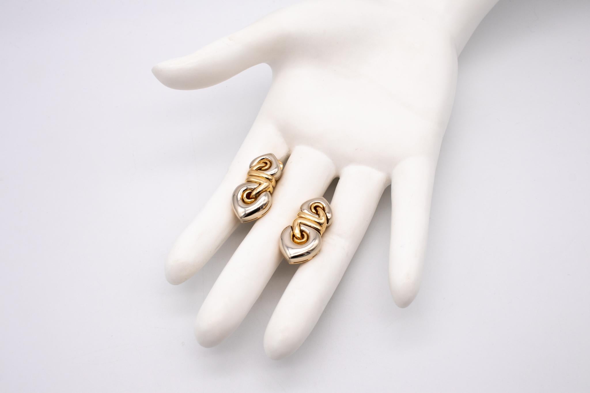Nice pair of earrings designed by Bvlgari.

Modern pair created by the house of Bvlgari in Italy. This are part of the iconic Doppio Cuore collection, crafted in solid 18 karats of white and yellow gold with high polish finish. Suited at the reverse