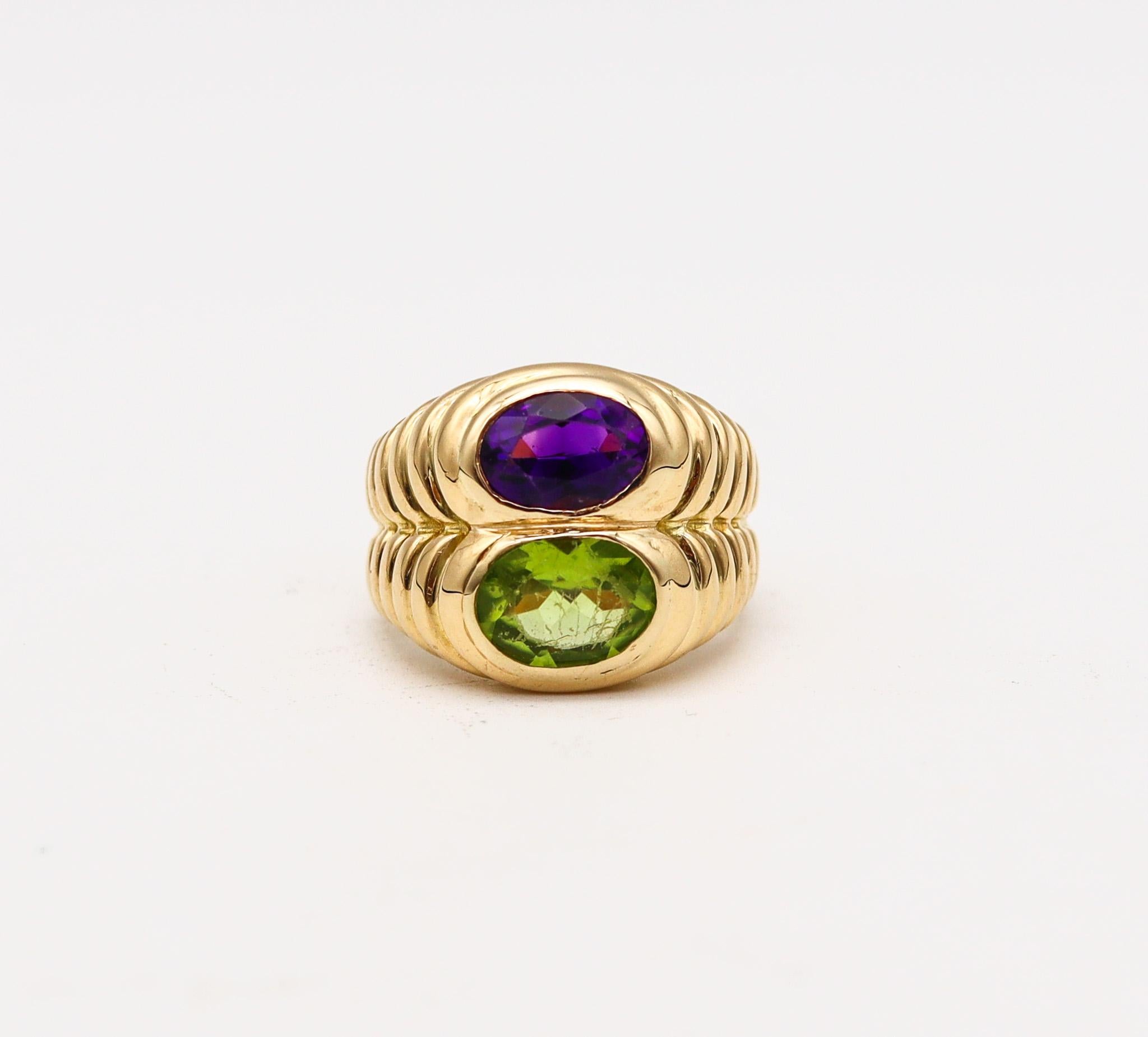 A gem-set doppio ring designed by Bvlgari.

Beautiful piece of jewelry, created in Rome Italy by the acclaimed jewelry house of Bvlgari. This popular ring is part of the iconic doppio collection and  was carefully crafted with stepped patterns in