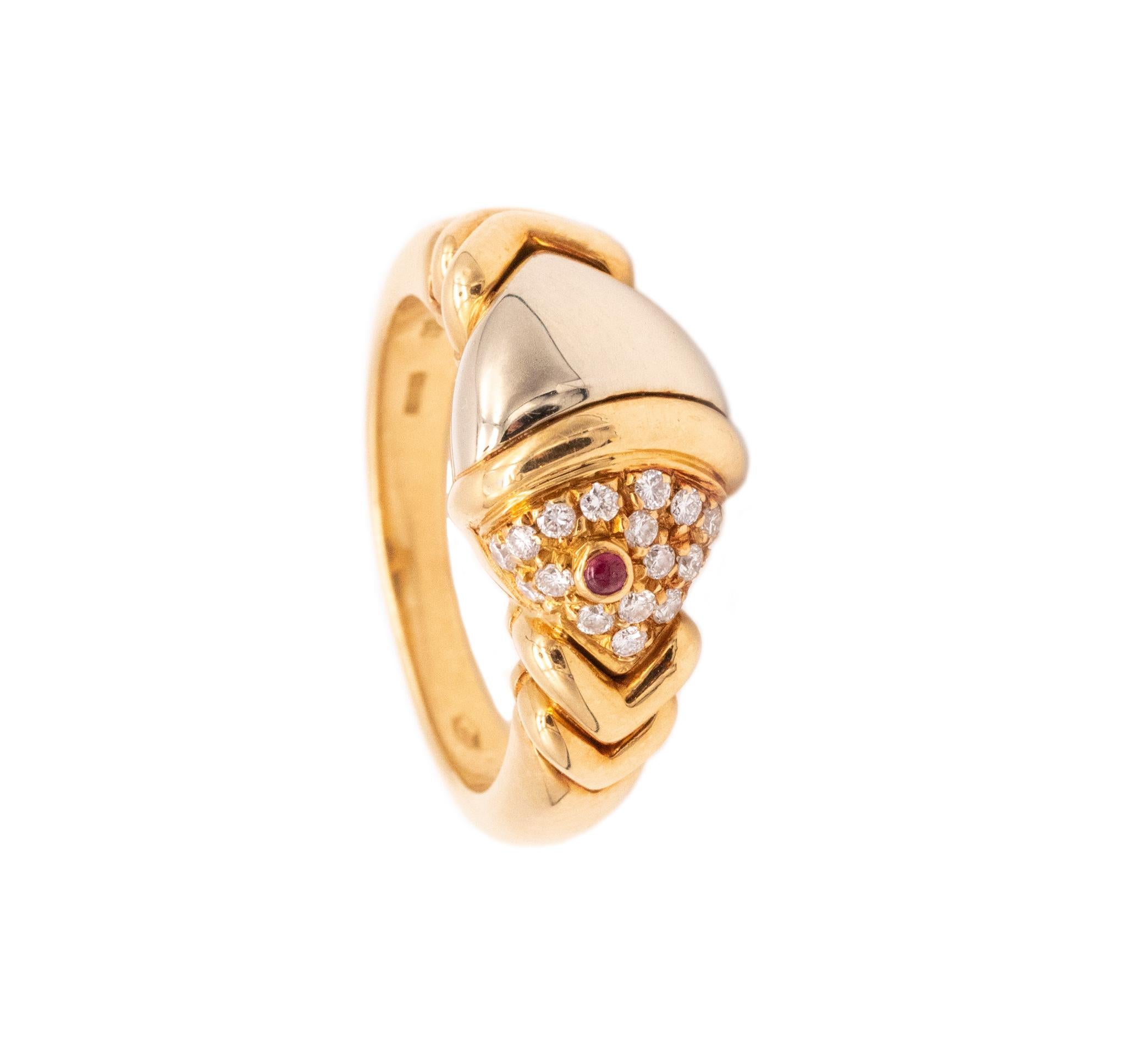 A ring in the shape of a fish designed by Bvlgari.

Very youthful vintage piece created by the house of Bvlgari in the shape of an stylized fish and crafted in solid 18 karats of yellow and white gold.

Set with 21 round brilliant cut diamonds (0.22