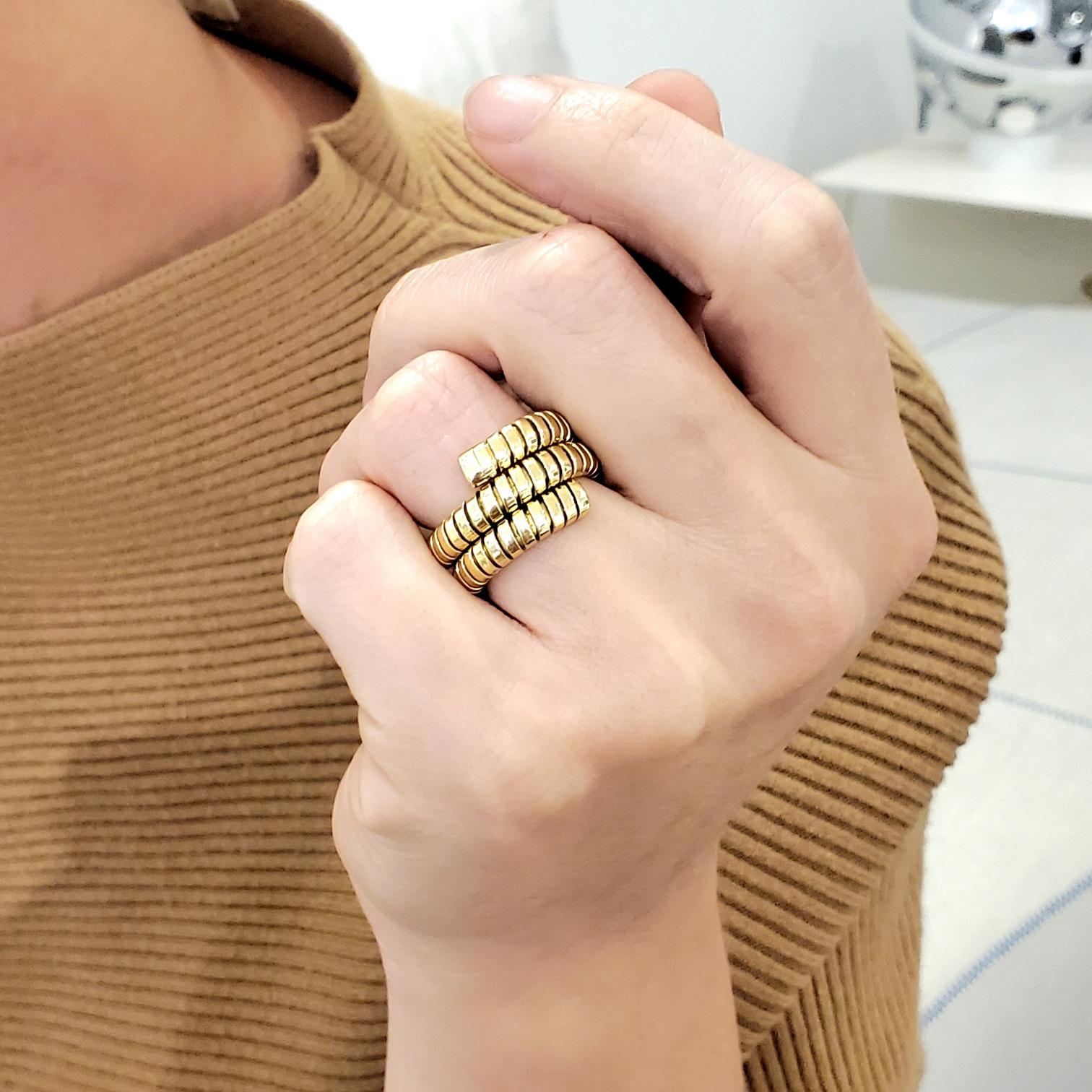 Tubogas serpenti ring designed by Bvlgari.

An iconic ring, created in Roma Italy by the jewelry house of Bvlgari. This popular spiral ring is from the Tubogas Serpenti collection and has been crafted in solid yellow gold of 18 karats with high