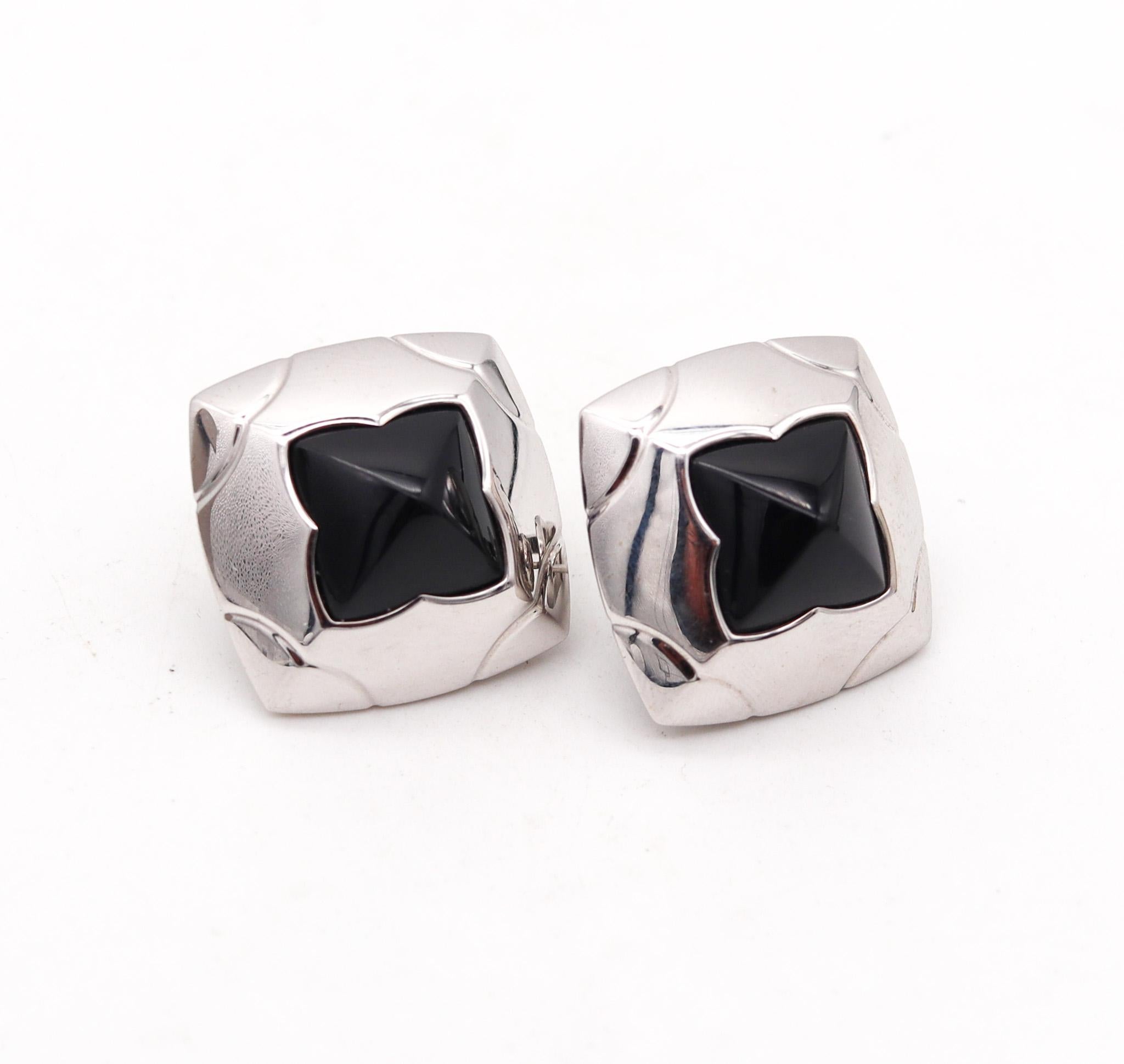 Pair of pyramid earrings designed by Bvlgari.

Actually this is one of the iconic pieces of jewelry, created in Milano Italy by the jewelry house of Bvlgari. These pair of clips earrings are from the Pyramide collection, designed back in the late