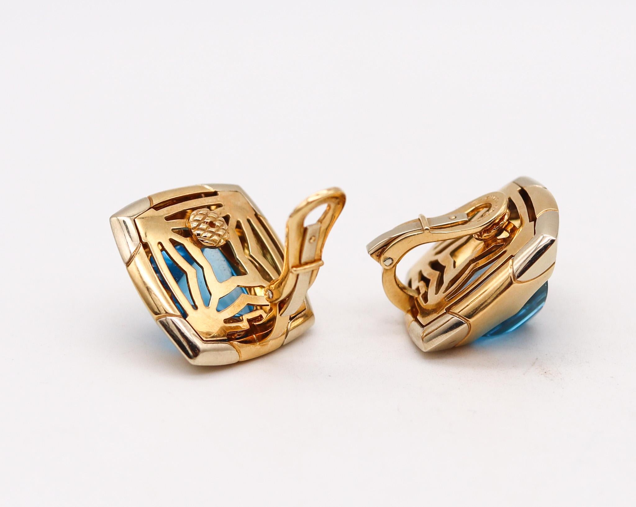 Modernist Bvlgari Roma Pyramid Clips Earrings in 18kt Gold with 36ctw Carved Blue Topaz For Sale
