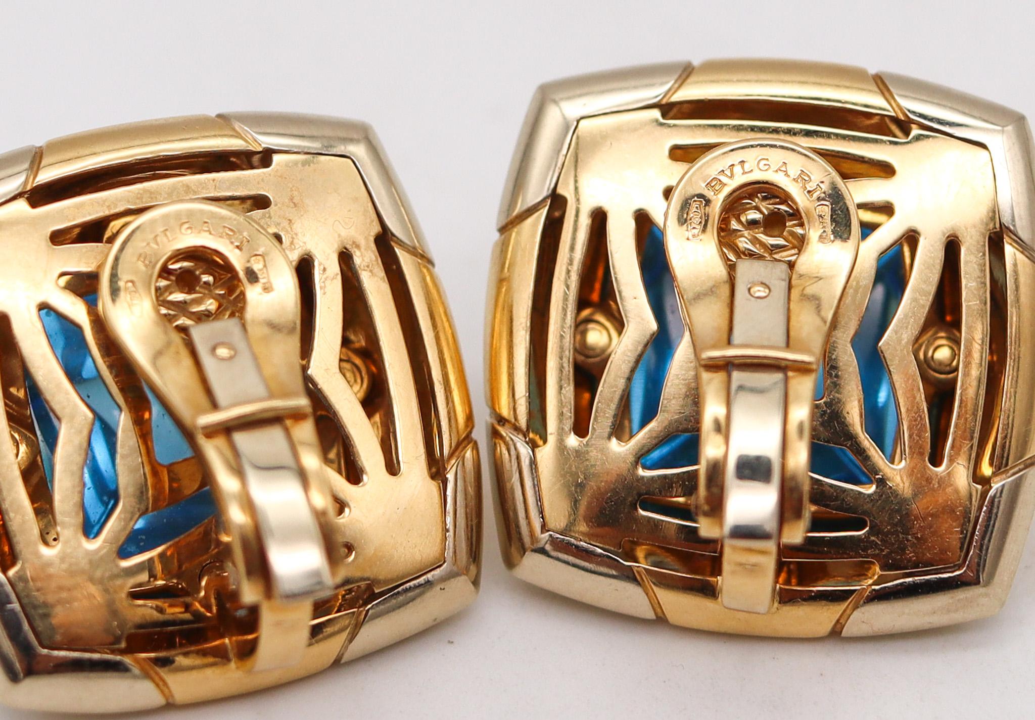 Sugarloaf Cabochon Bvlgari Roma Pyramid Clips Earrings in 18kt Gold with 36ctw Carved Blue Topaz For Sale