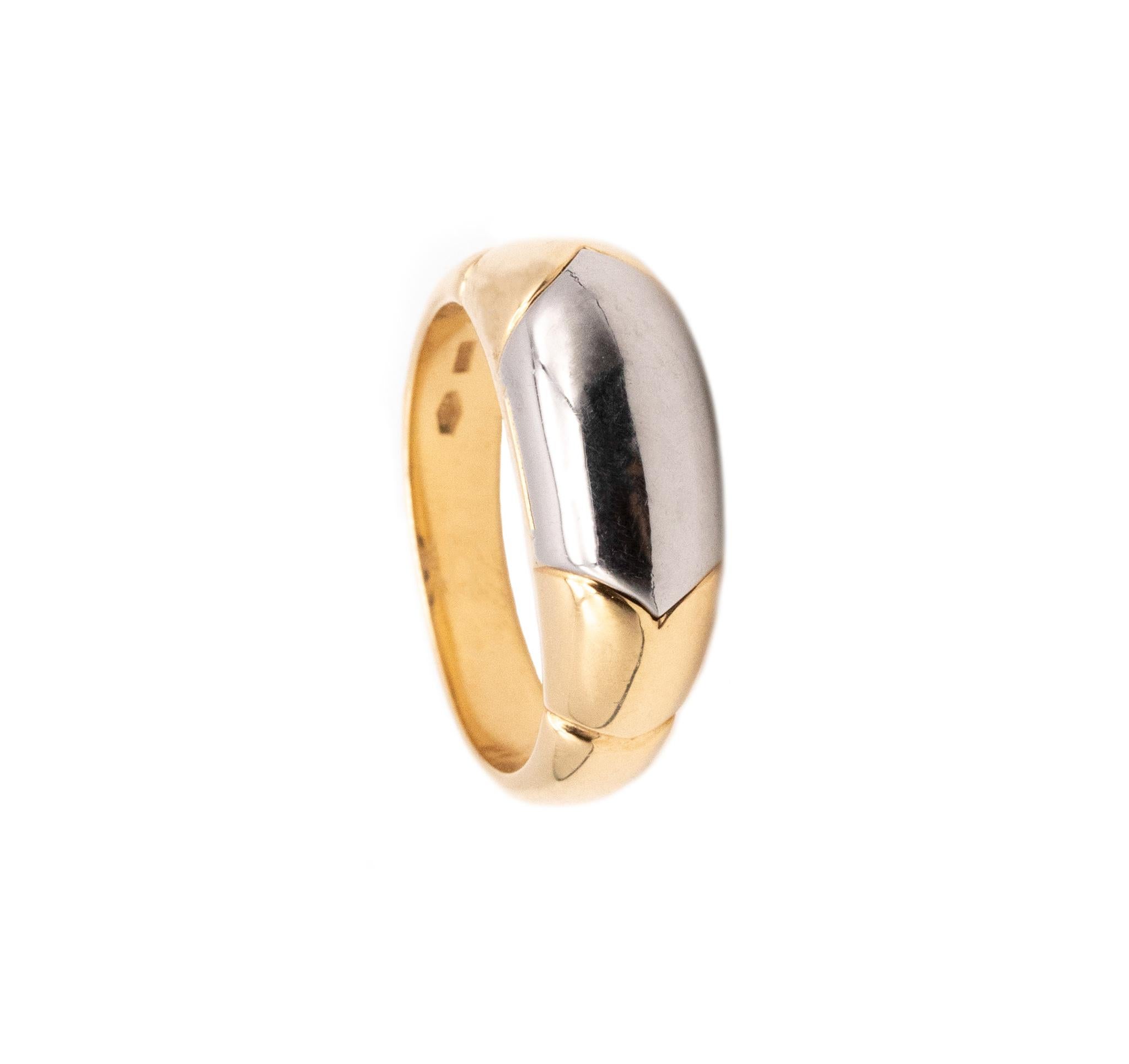 Modern Tronchetto ring designed by Bvlgari. 

An iconic and popular piece from the house of Bvlgari. This Tronchetto ring has been crafted in solid 18 karats of high polished yellow and white gold. 

Have a total weight of 8.3 grams and the actual