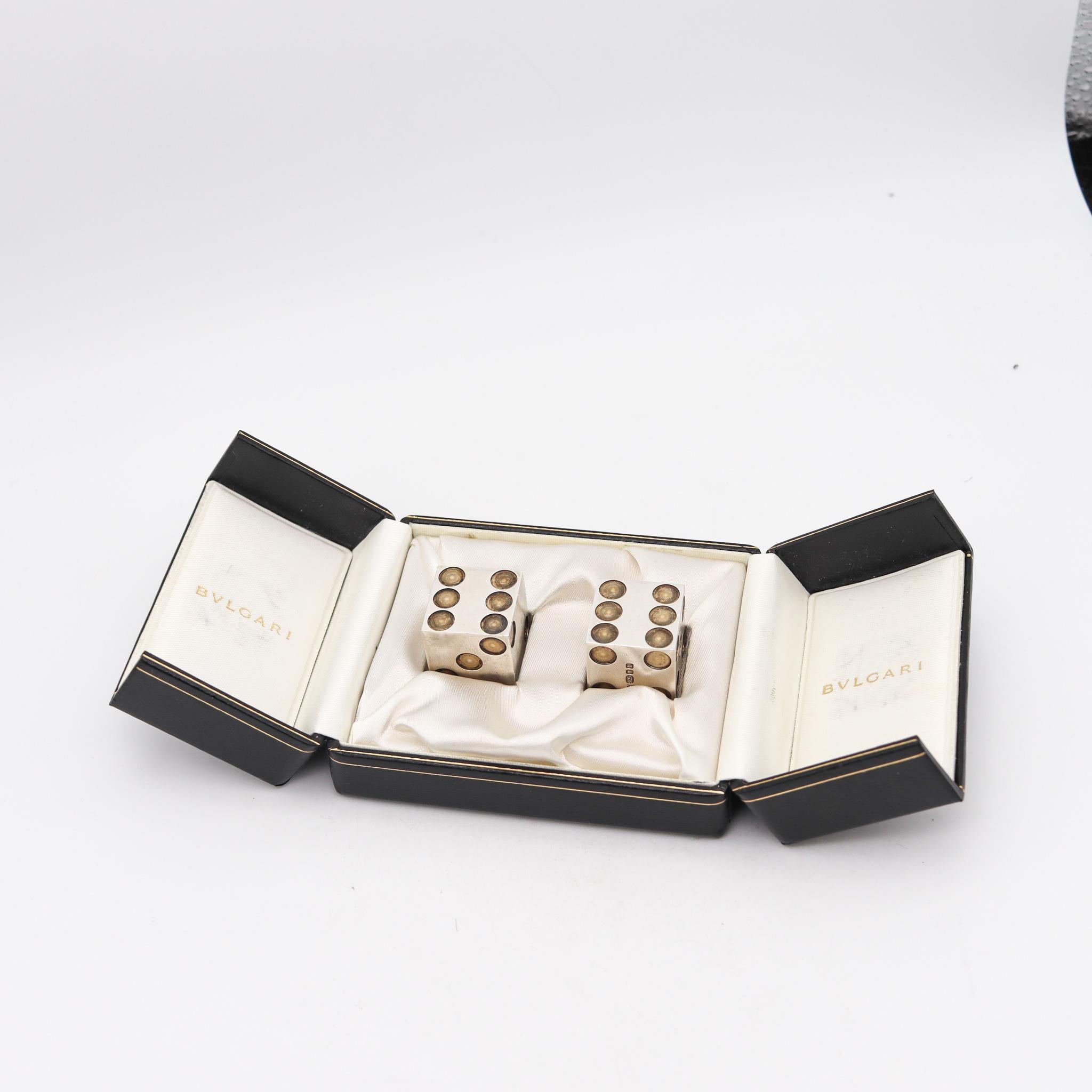 Pair of dices designed by Bvlgari.

Very rare, unusual and a great opportunity to own this pair of highly collectible Bvlgari sterling silver dices set. It is a perfect gift for the collector or gambler who has it all. They are hallmarked with
