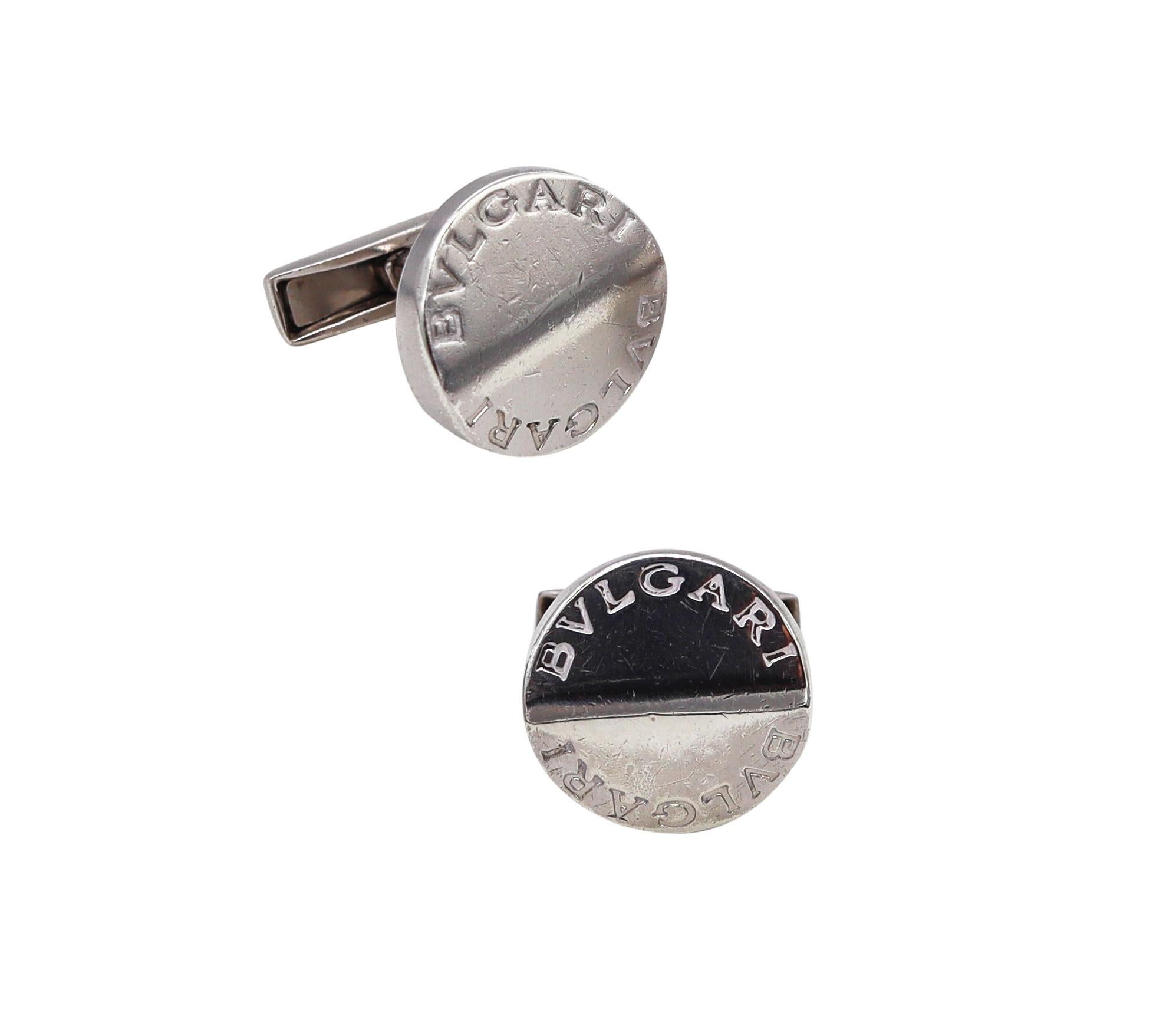 Pair of cufflinks designed by Bvlgari.

Beautiful sleek pieces, made in Rome Italy by the house of Bvlgari. They was crafted in solid .925/.999 sterling silver featuring the double name of Bvlgari and suited with movable backs for comfort