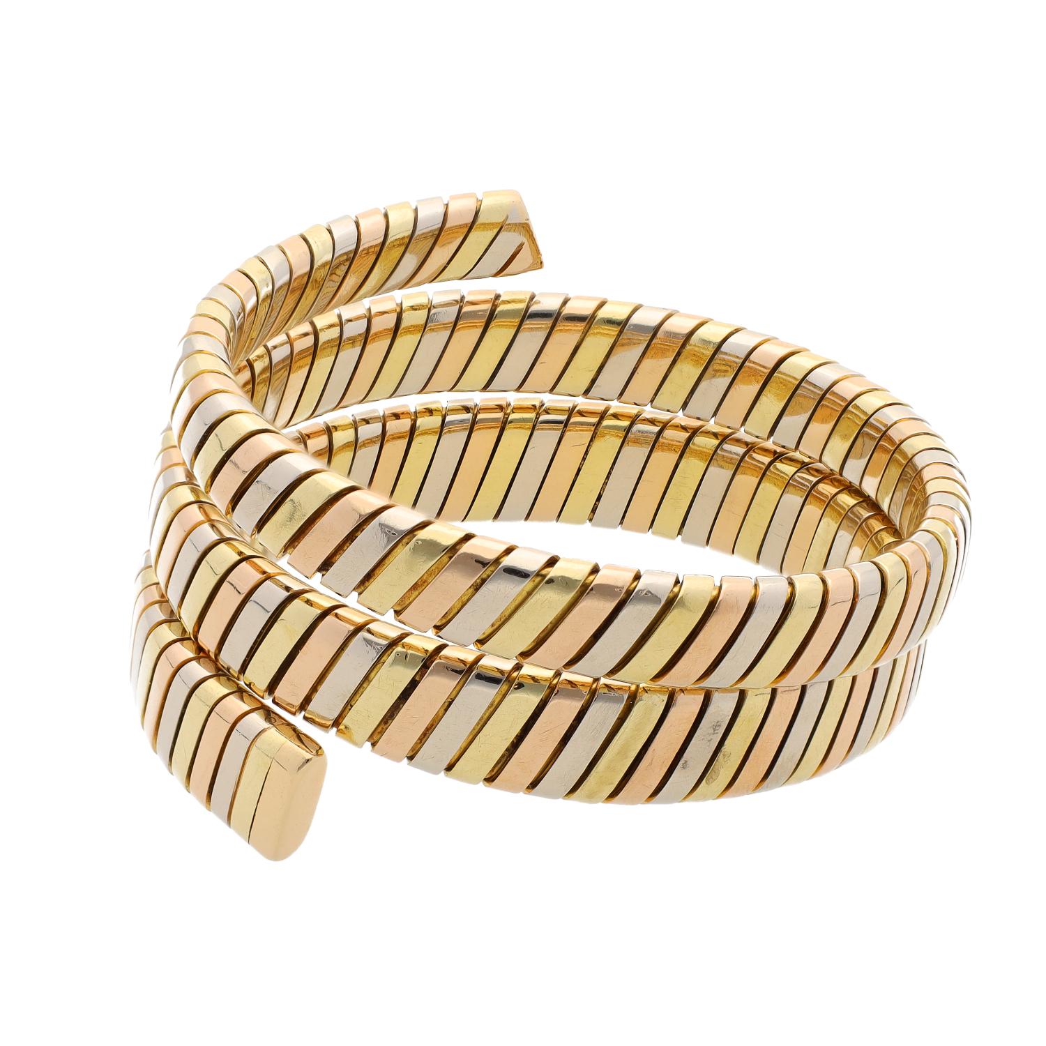 Bvlgari Roma Vintage Tre Colore Gold Tubogas Tapered Spiral Bracelet

Bulgari Rome 1980s yellow, red, white 18kt gold Tubogas tapered spiral bracelet from our Signed Jewels Vintage Collection. Fully signed and marked Bulgari