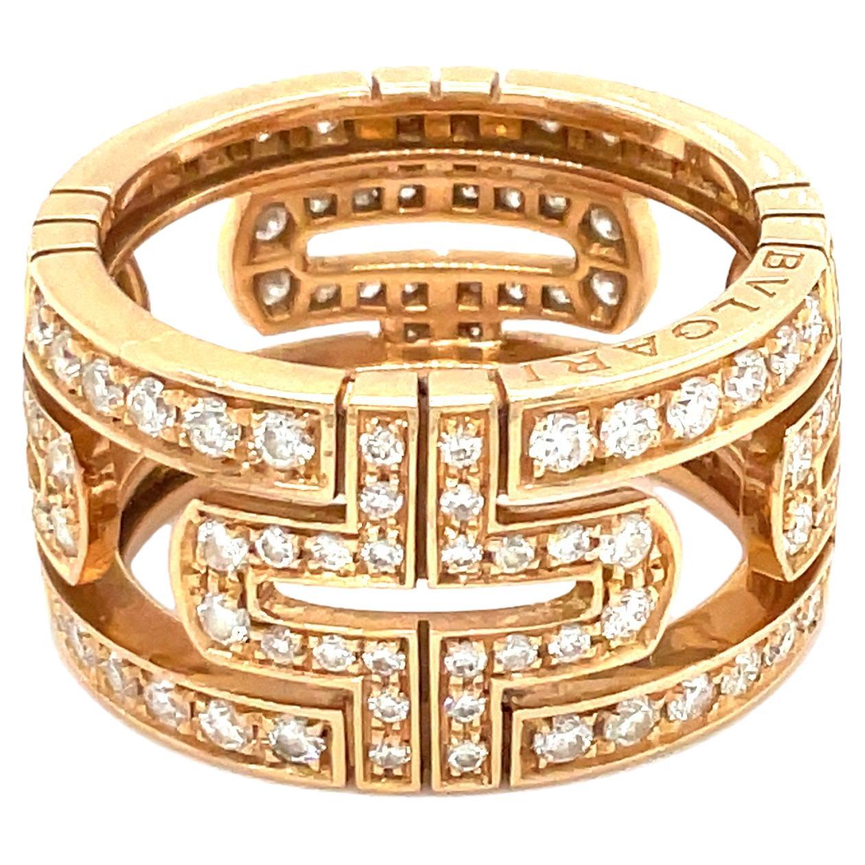 The BVLGARI Rose Gold and Diamond 'PARENTESI' Ring is a stunning piece that blends modern elegance with timeless style. Crafted in luxurious rose gold and adorned with sparkling diamonds, the ring features the iconic Parentesi design, inspired by