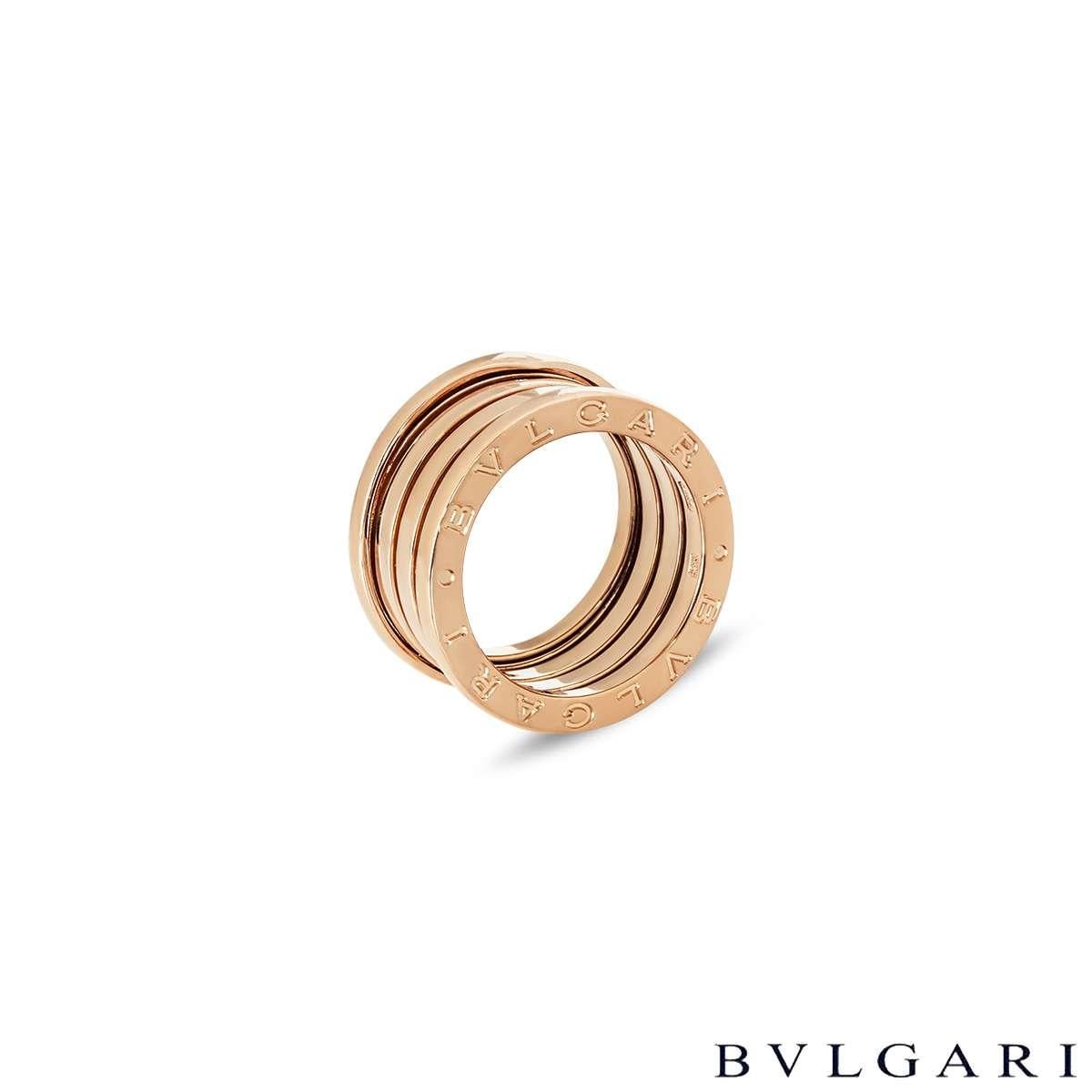 A classic 18k rose gold ring by Bvlgari from the B.Zero1 collection. Comprises of the iconic spiral design bands with the 'Bvlgari Bvlgari' logo engraved around the outer edges. The ring is a size UK M - EU 52 and has a gross weight of 10.4