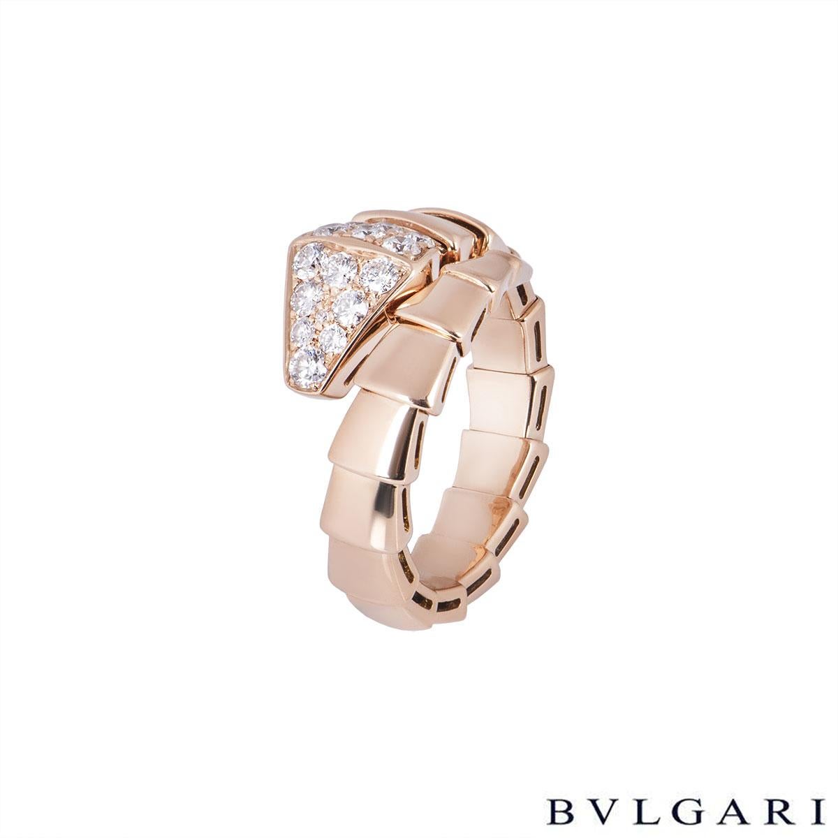 An 18k rose gold diamond ring by Bvlgari from the Serpenti collection. The ring is in the form of a serpent wrapping around the finger, comprising 19 graduating flexible intersections including the diamond set head of a snake. The head has 15 round