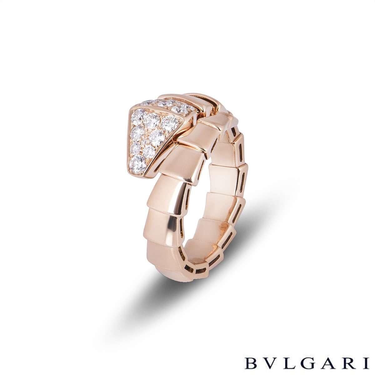 An 18k rose gold diamond ring by Bvlgari from the Serpenti collection. The ring is in the form of a serpent wrapping around the finger, comprising 17 graduating flexible intersections including the diamond set head of a snake. The head has 15 round