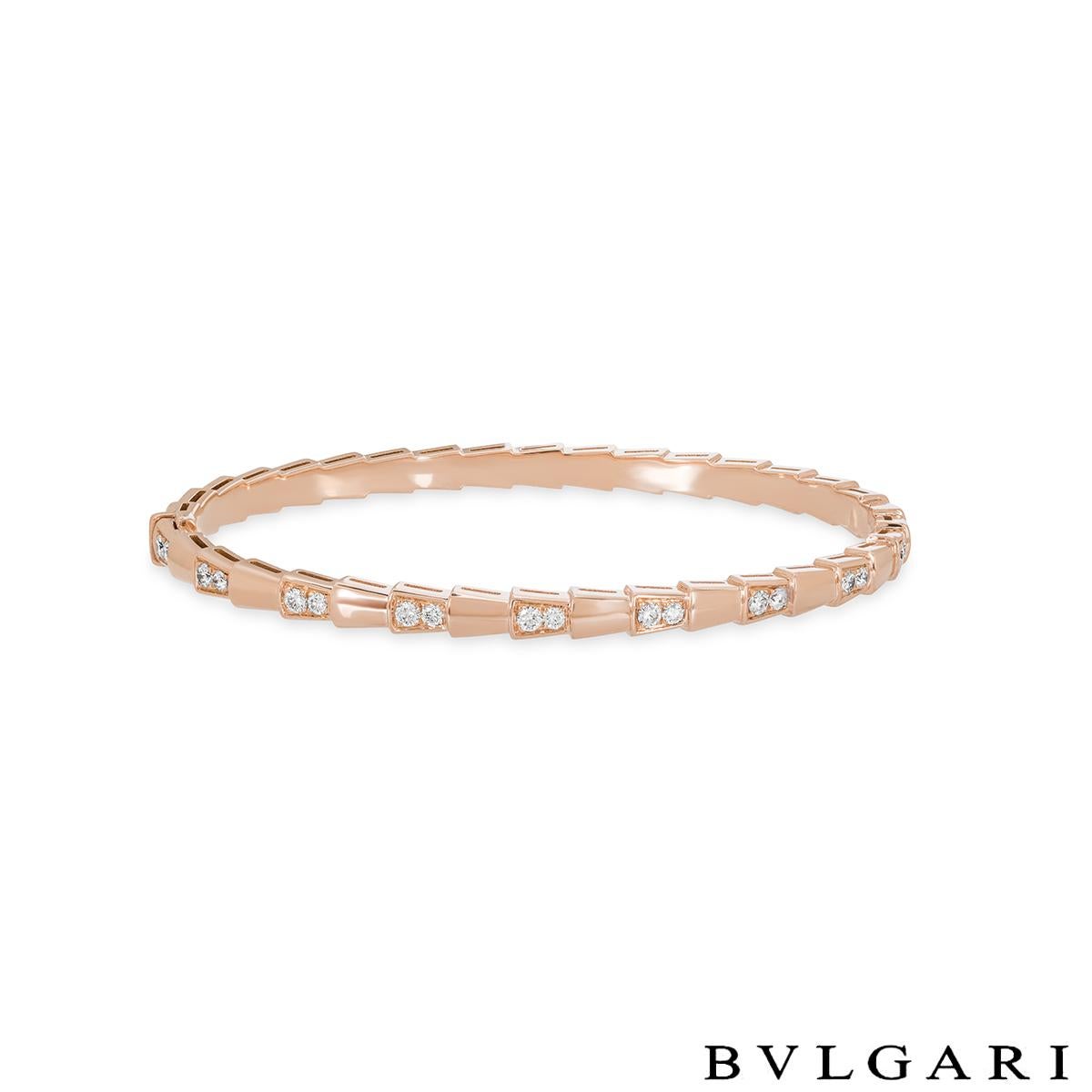 A stunning 18k rose gold diamond bracelet by Bvlgari from the Serpenti collection. The bracelet is in the form of a serpent and beautifully alternates between high polish and diamond sections that evoke the viper's spiral move before it strikes. The